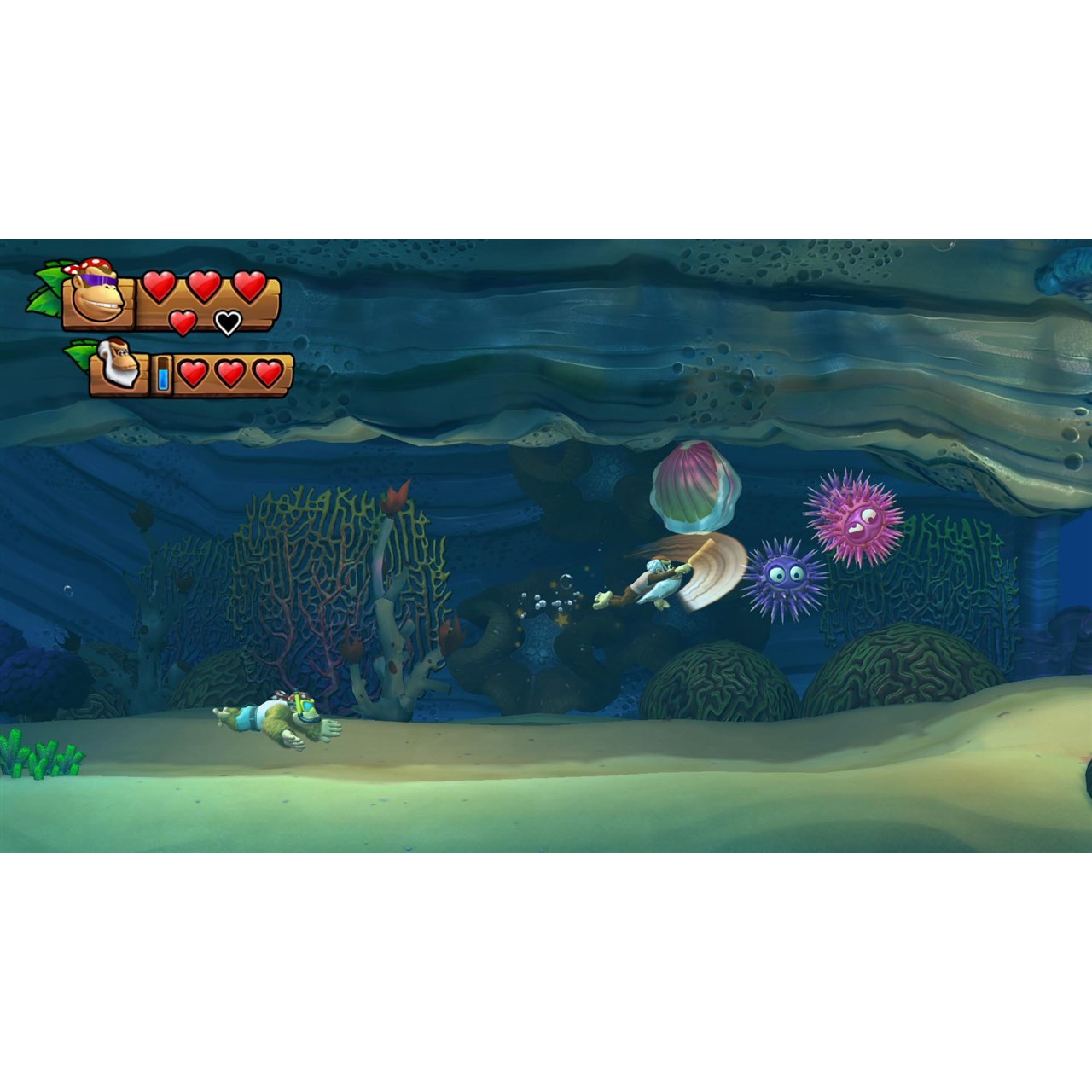 Underwater scene with two characters. The main character is fighting jellyfish and urchins.
