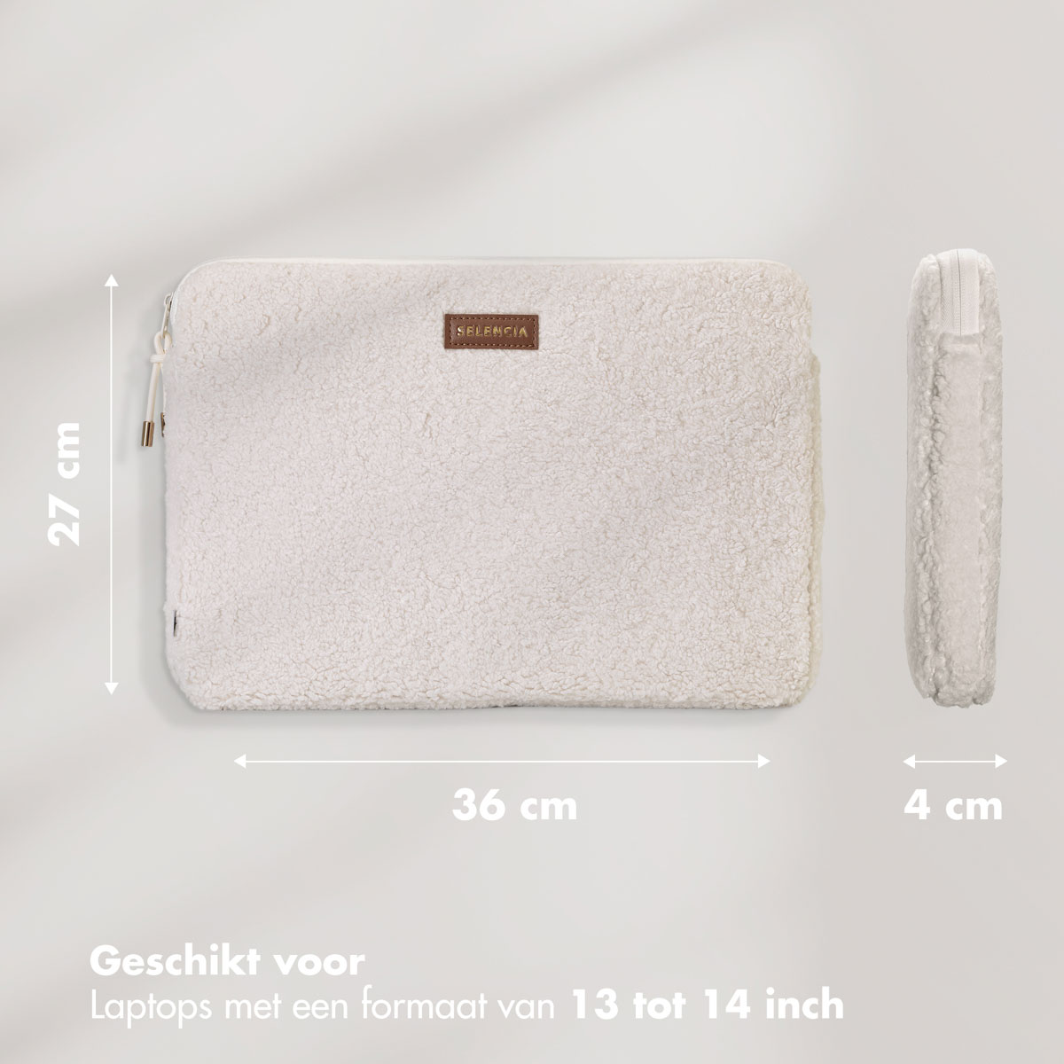 A white fluffy laptop sleeve. Dimensions are 27cm x 36cm x 4cm. Text indicates it fits 13-14 inch laptops.