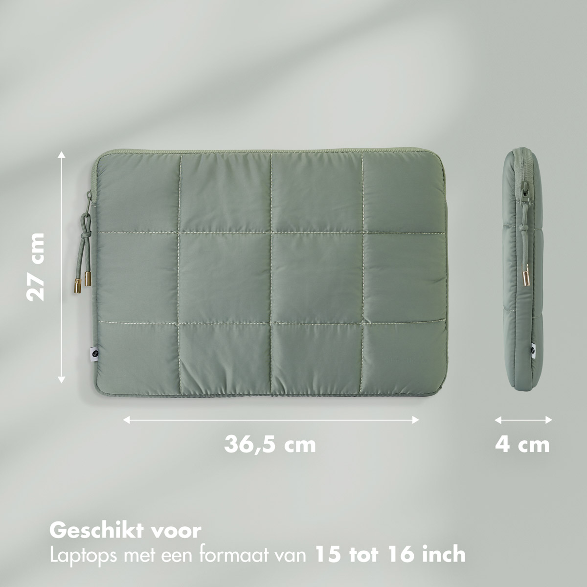 A green quilted laptop sleeve with dimensions. 36.5x27cm, 4cm side view.