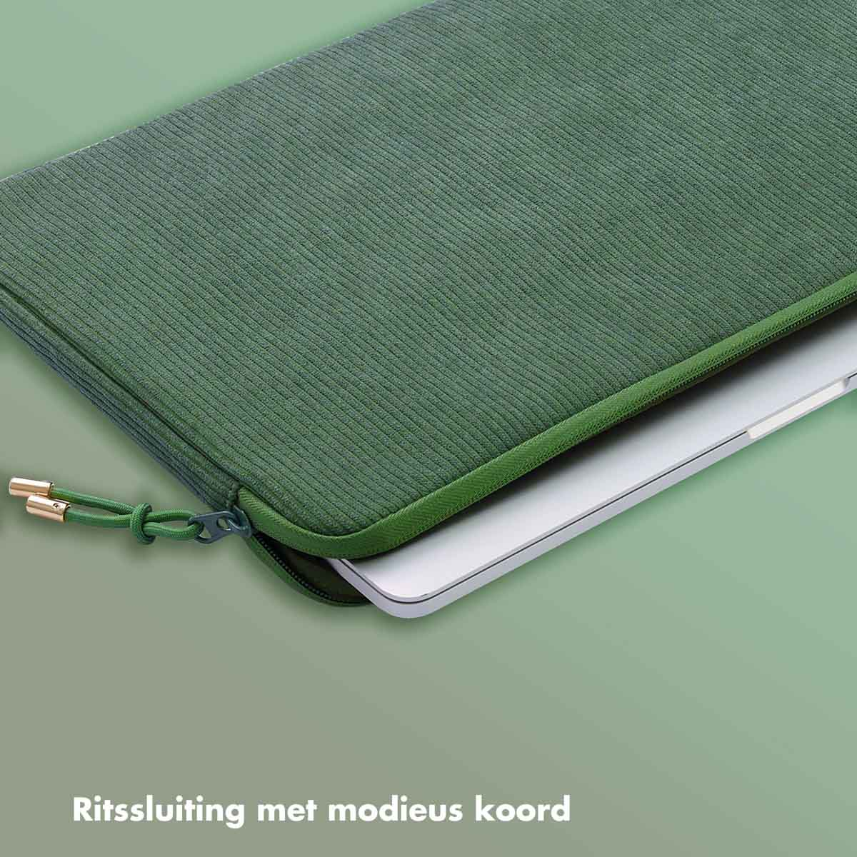 A green laptop sleeve with a zipper, and a laptop inside on a green background.