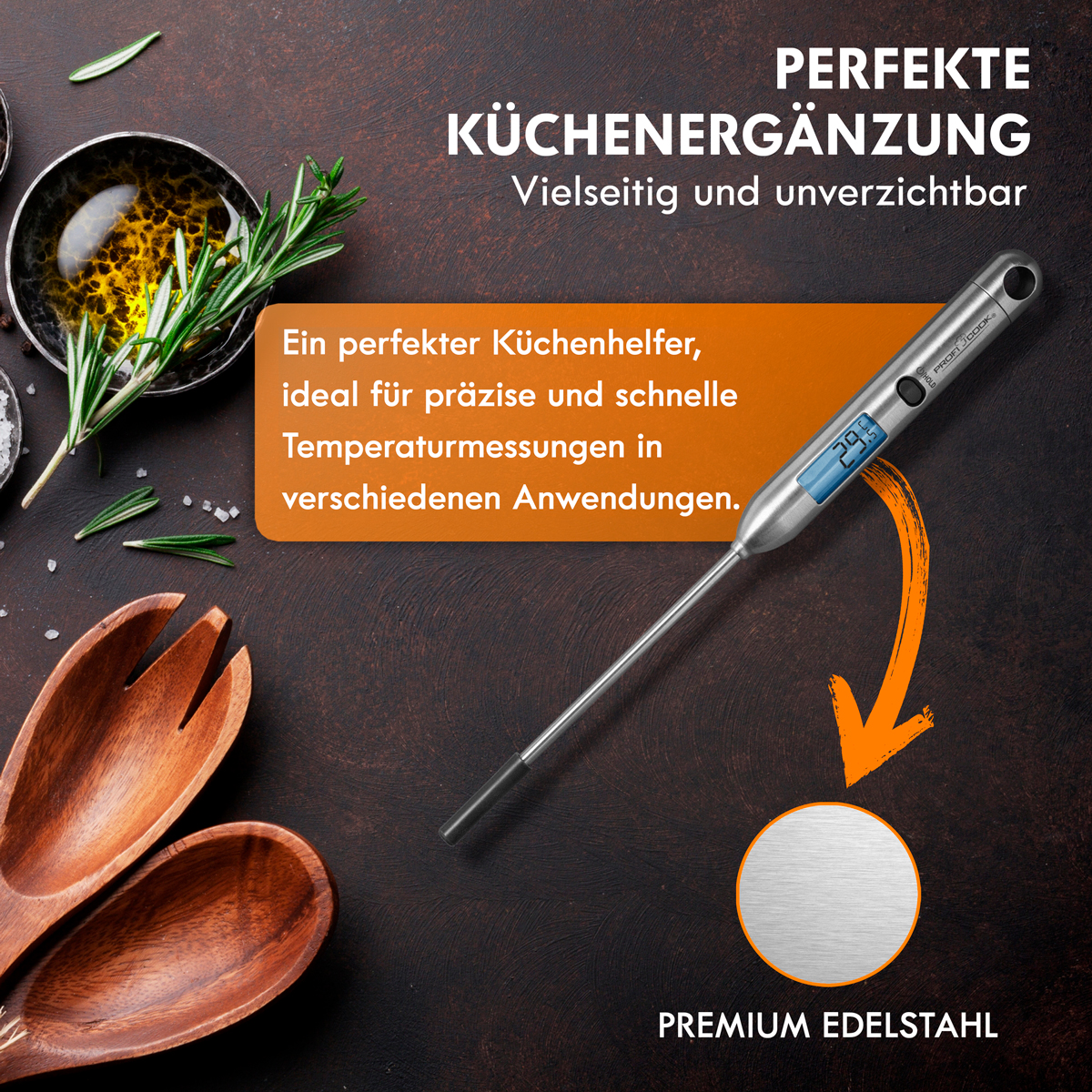 Termometr mierzy 29,6 stopnia. W tle znajdują się drewniane łyżki i inne przedmioty.