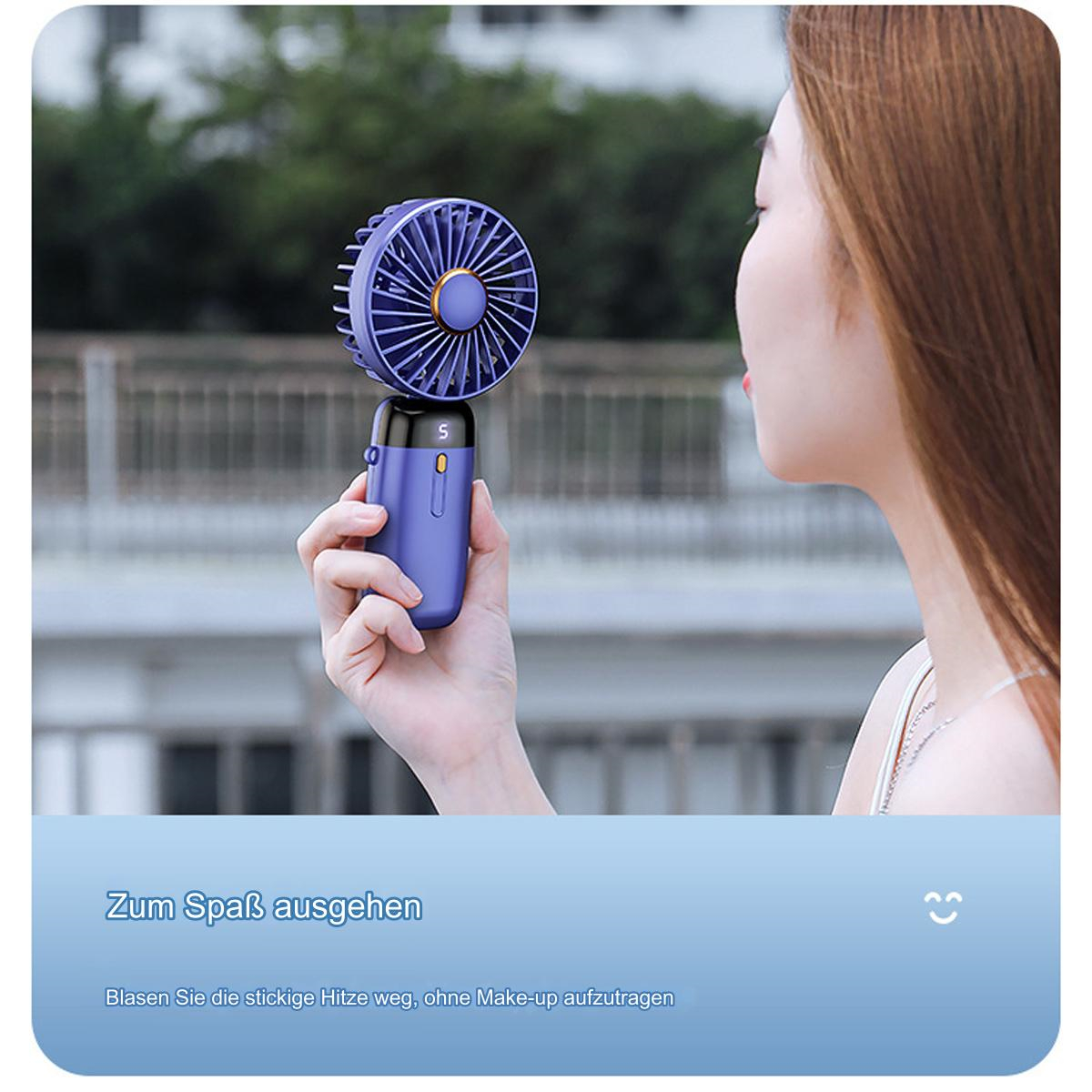 Eine Frau, die einen lila und schwarzen Mini-Ventilator hält.