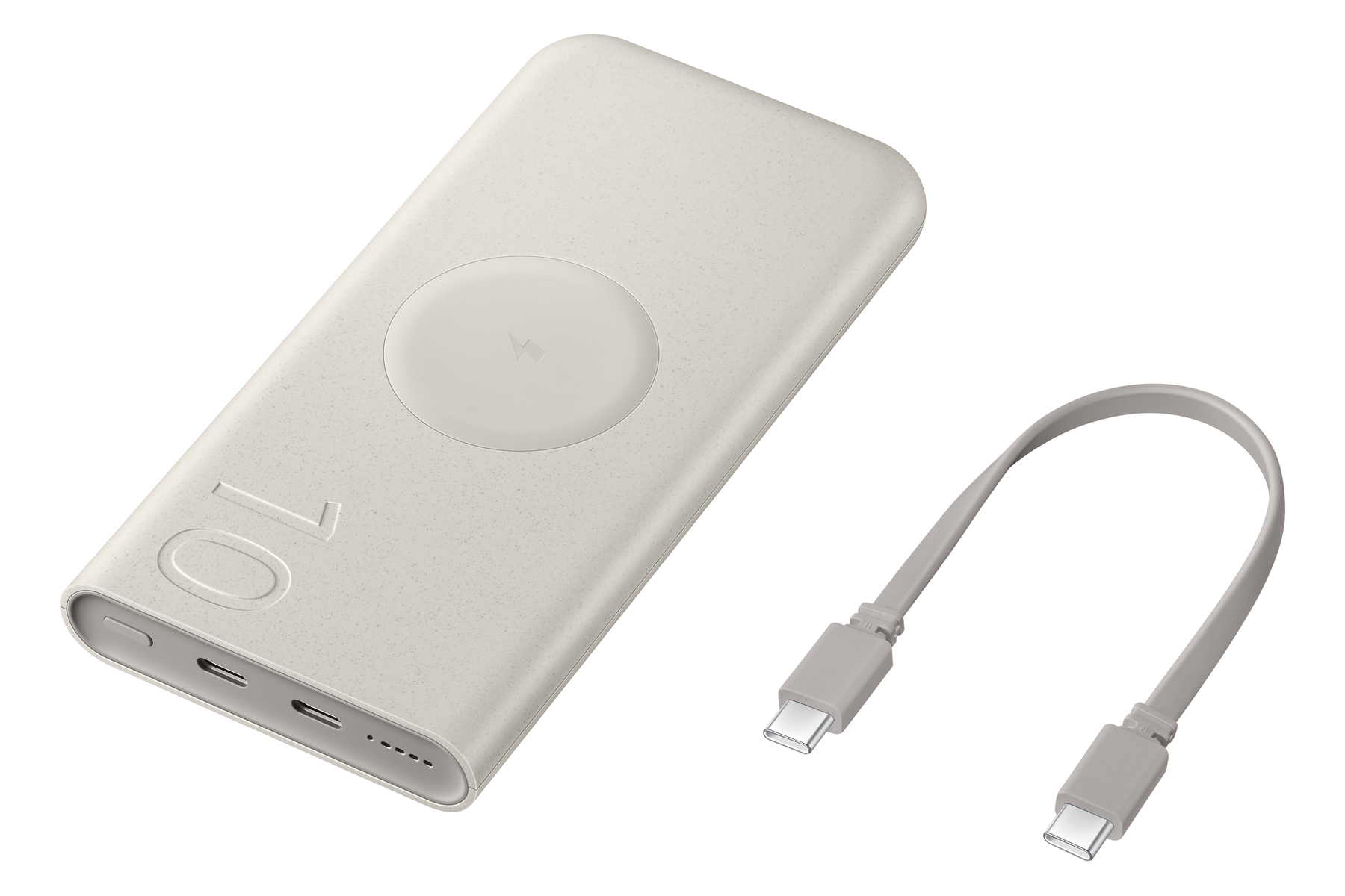 Batterie externe beige avec câble de charge. Cercle de charge sans fil dessus.