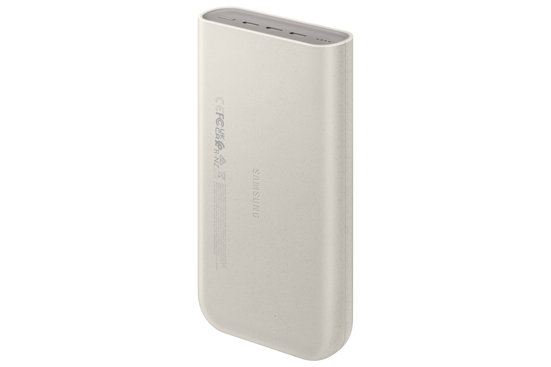 Une batterie externe de couleur crème avec du texte et des ports. L'arrière de l'appareil est visible.