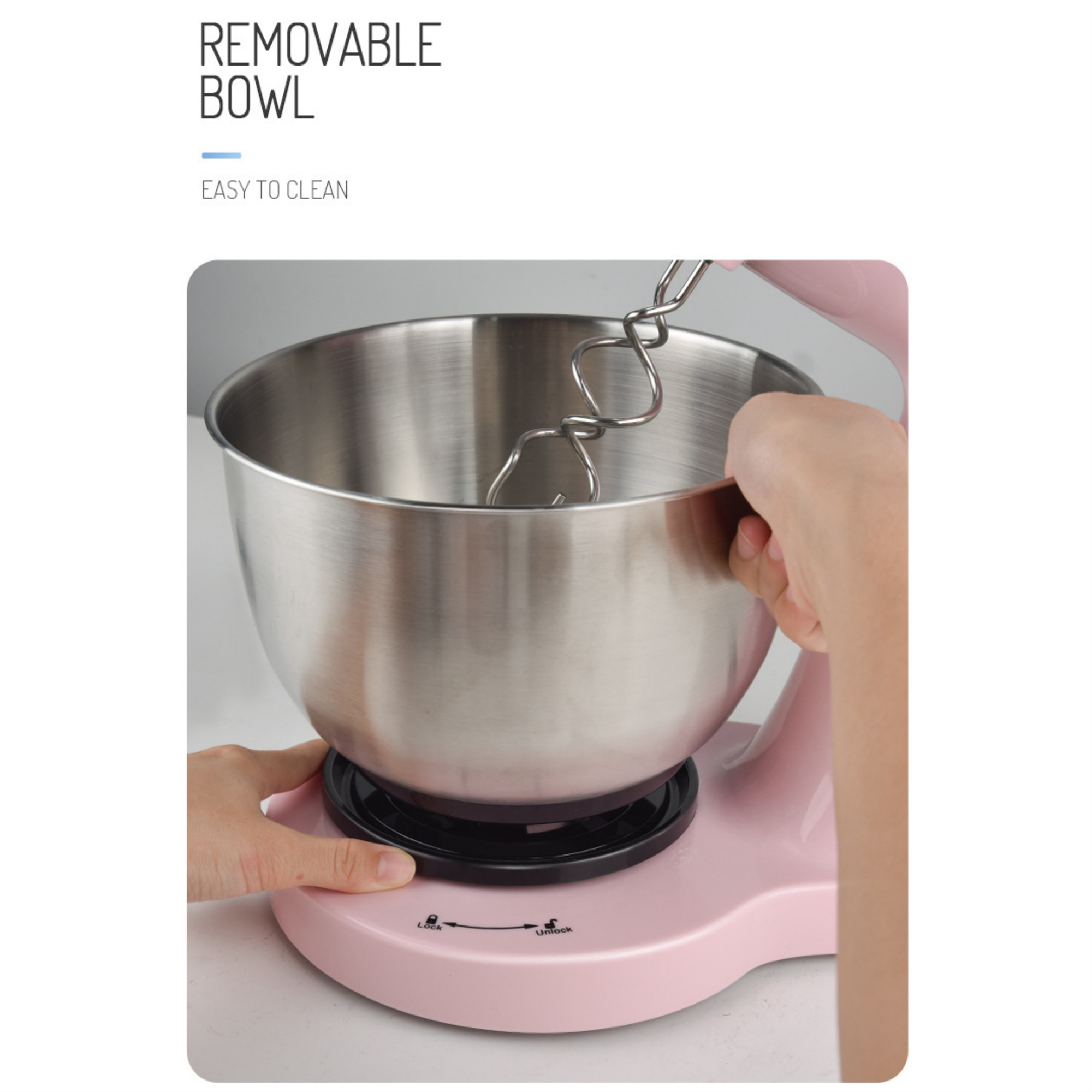 Rosa Küchenmaschine mit Edelstahlschüssel, Hände entfernen Schüssel.