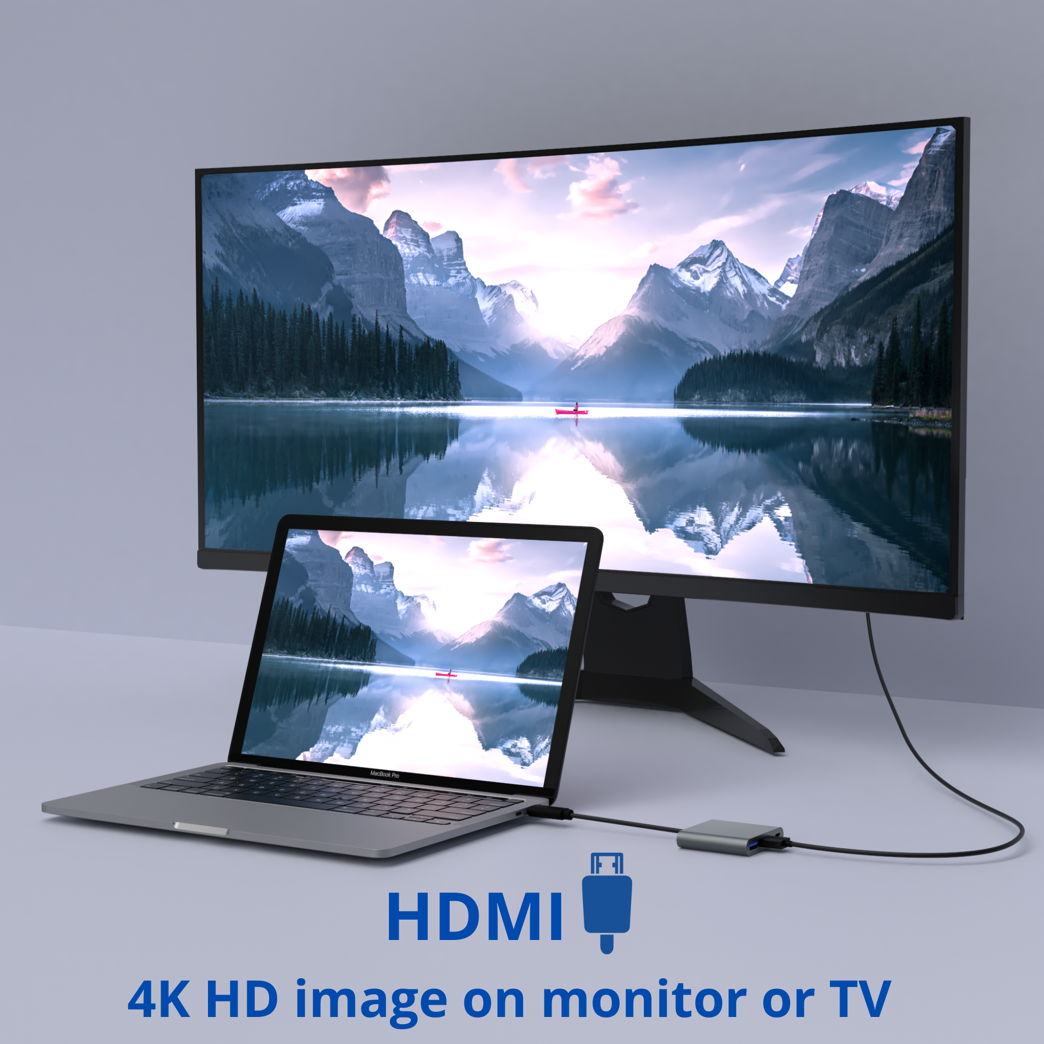 Ordinateur portable et moniteur montrant une scène de montagne. Un câble HDMI les relie. Le fond est gris clair.