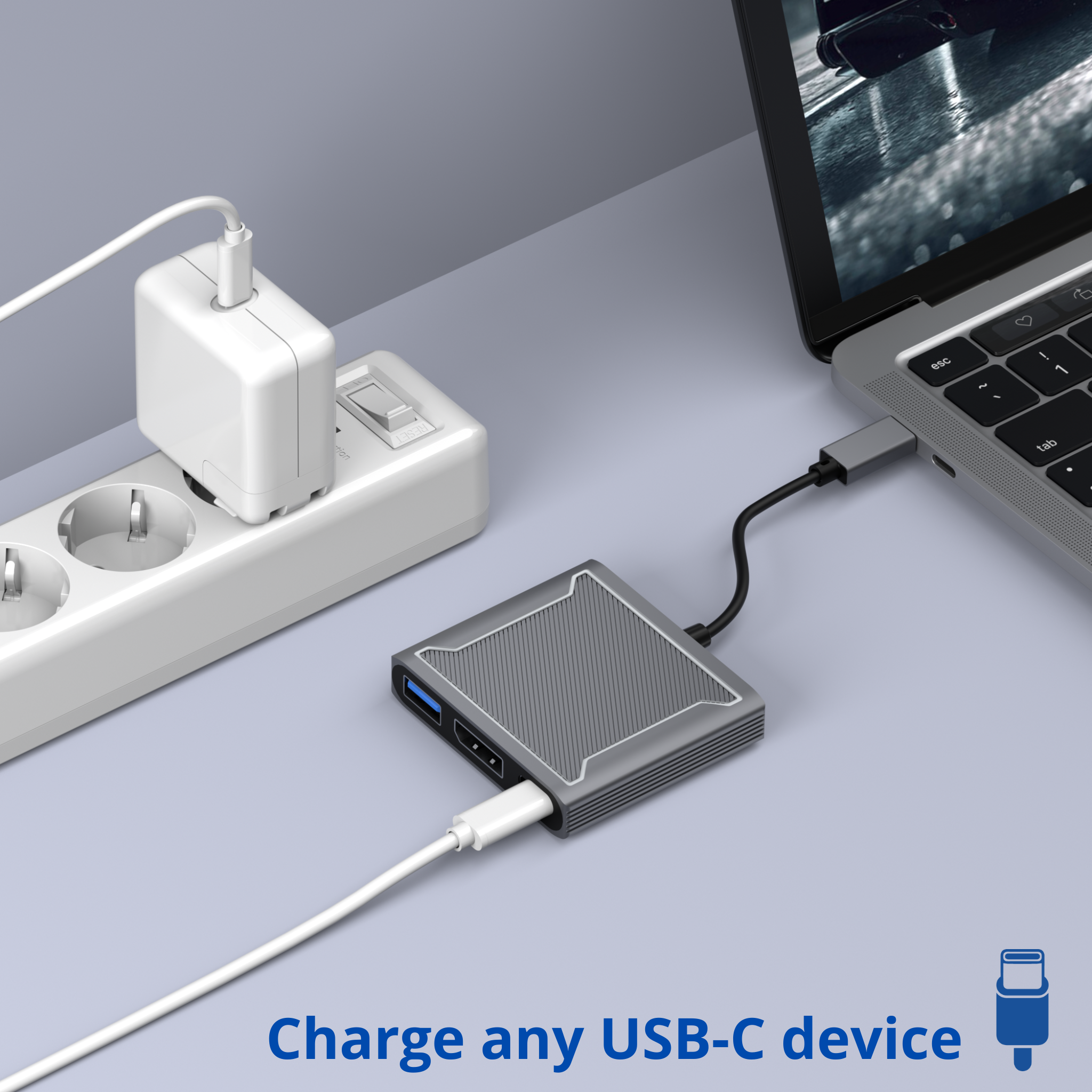 Ordinateur portable connecté à un hub USB-C et un adaptateur secteur. Texte : Chargez n'importe quel appareil USB-C.