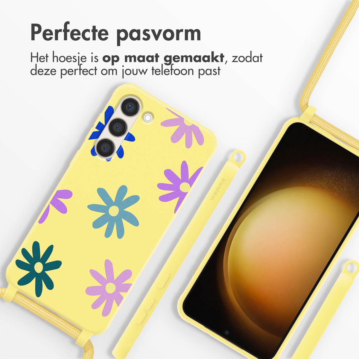 Gele telefoonhoes met bloemen en een koord. De telefoon zit in de hoes en het ontwerp is zichtbaar.