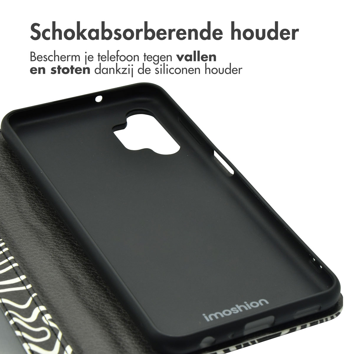 Coque noire avec couvercle ouvert. Motif noir et blanc à l'intérieur.