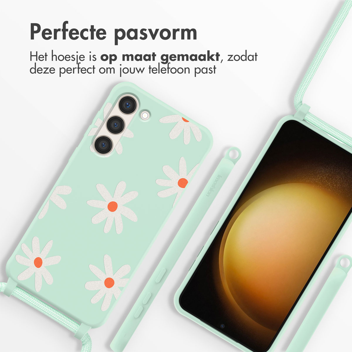 Mintgroene telefoonhoes met madeliefjes en een koord. De telefoon zit in de hoes, ontwerp zichtbaar.