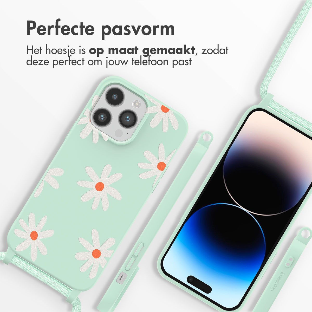Mintgroene telefoonhoes met madeliefpatroon. Telefoon met hoesje en koord.