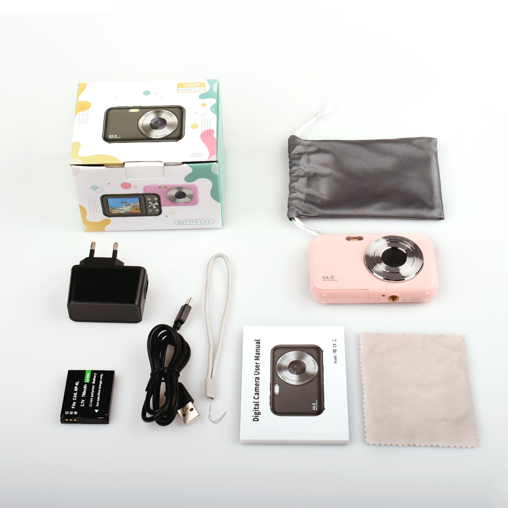 Zestaw aparatu cyfrowego z akcesoriami, w tym aparat, ładowarka i instrukcja obsługi.