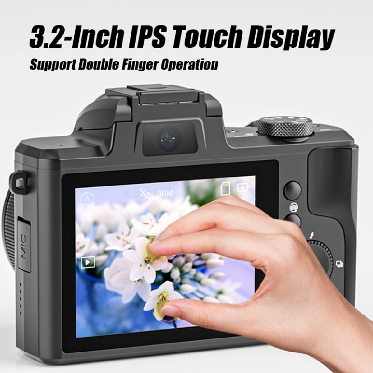 Czarny aparat cyfrowy z dłonią osoby dotykającą ekranu, wyświetlający obraz kwiatowy.