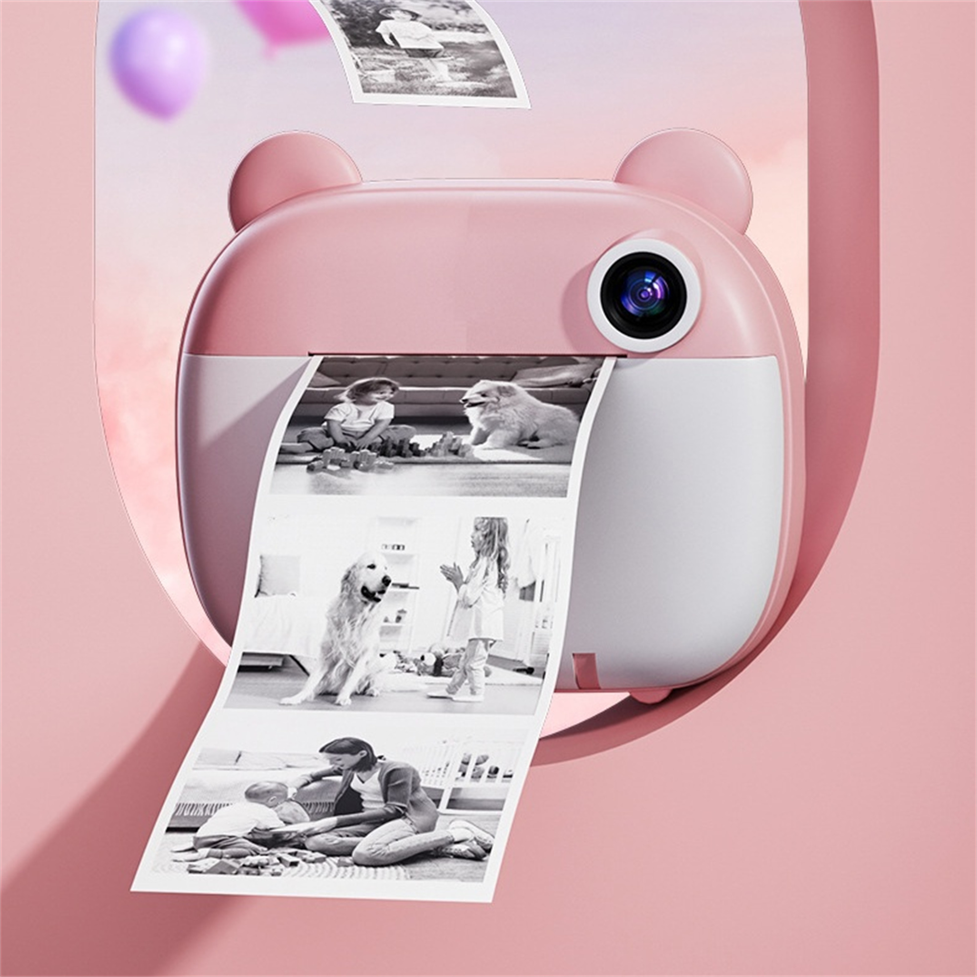 Rosa Sofortbilddrucker, der Fotos druckt. Bär-Design. Rosa Hintergrund.