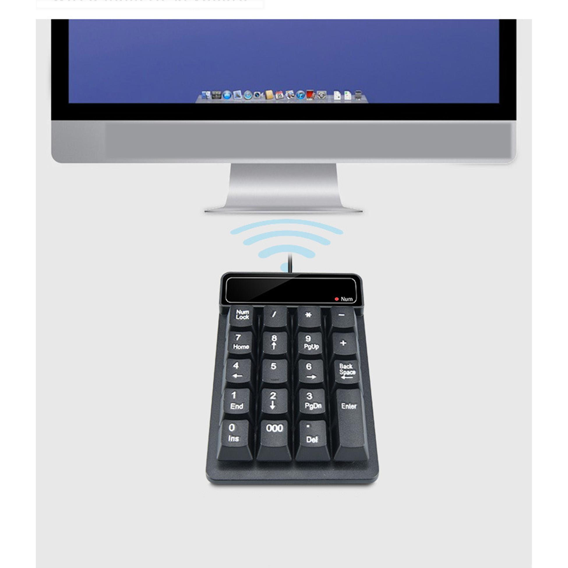 Kabelloser numerischer Tastenblock mit Tasten und einem Bildschirm. An Computer.