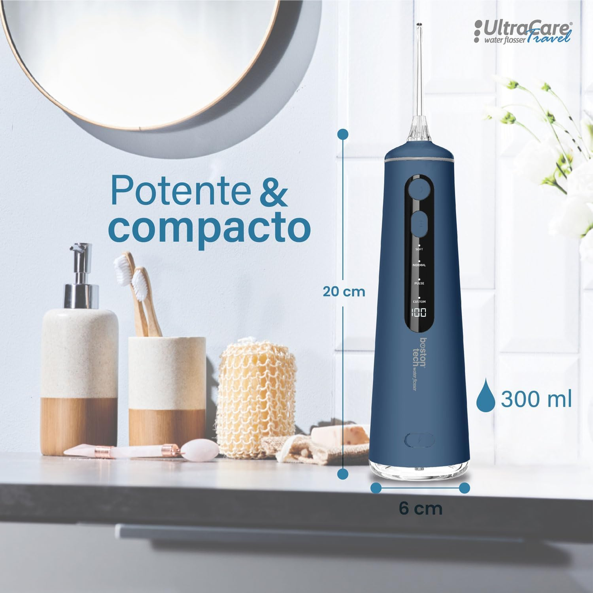 Irrigador dental azul con accesorios en una repisa, fondo de espejo.