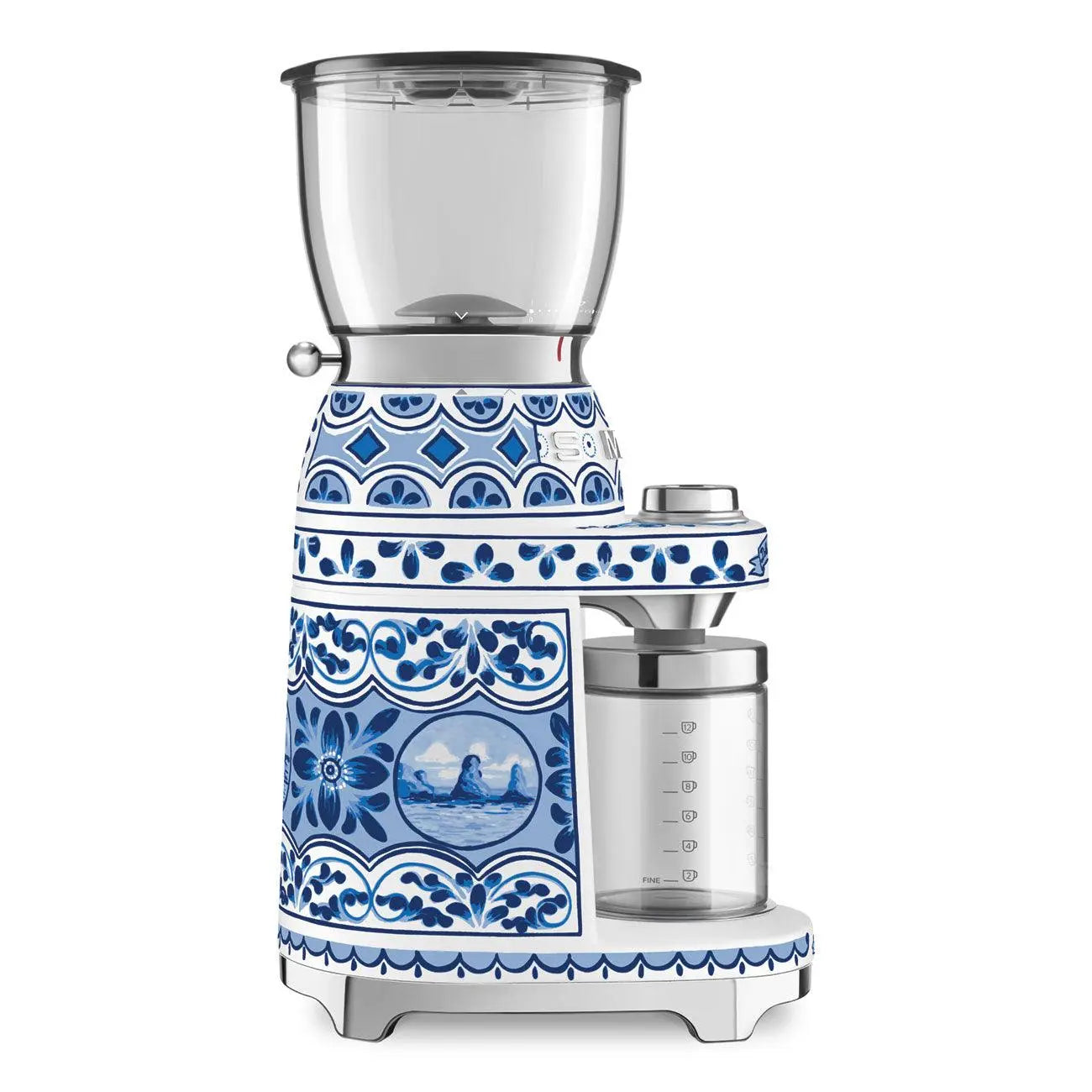 Molinillo de café con diseño floral azul. Contenedor transparente de granos arriba. Contenedor de vidrio abajo.