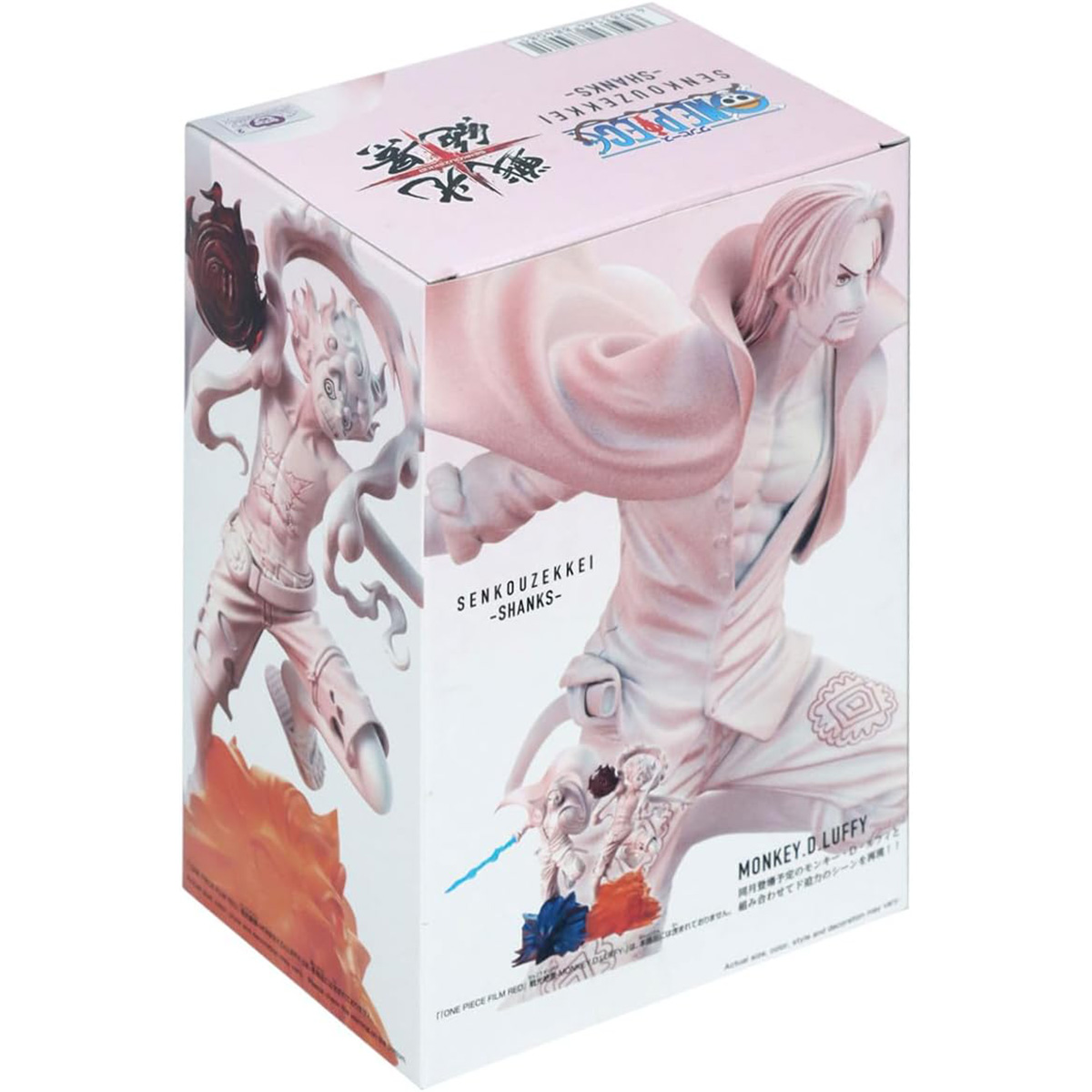 Una caja muestra una figura de One Piece de Shanks y Monkey D. Luffy. La caja muestra las figuras de los personajes.