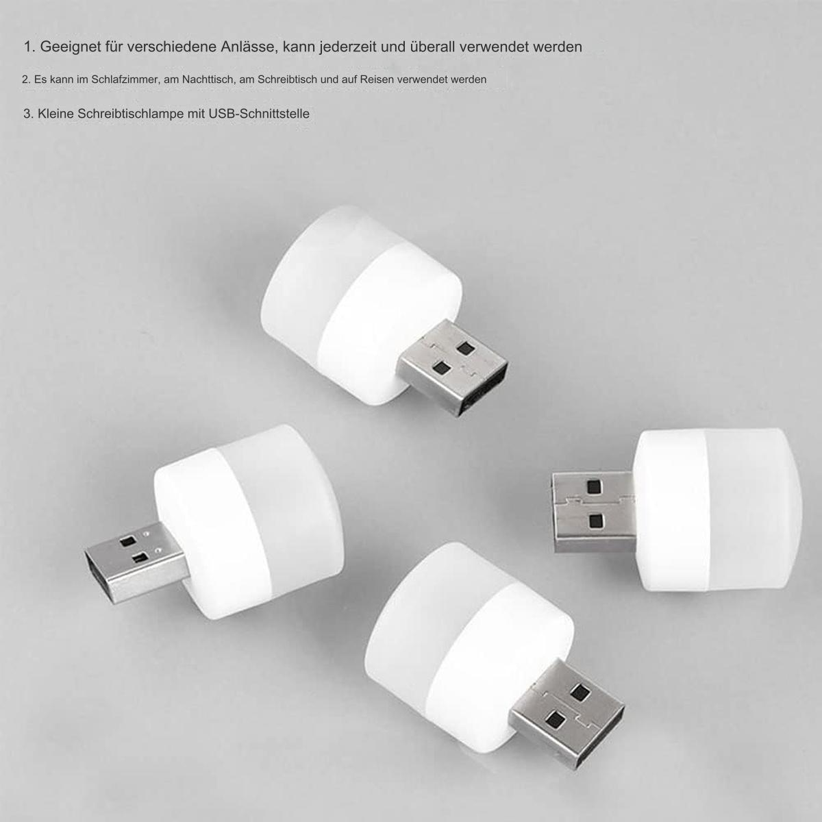 Vier kleine, weiße USB-Leuchten mit USB-Anschluss auf grauer Oberfläche.