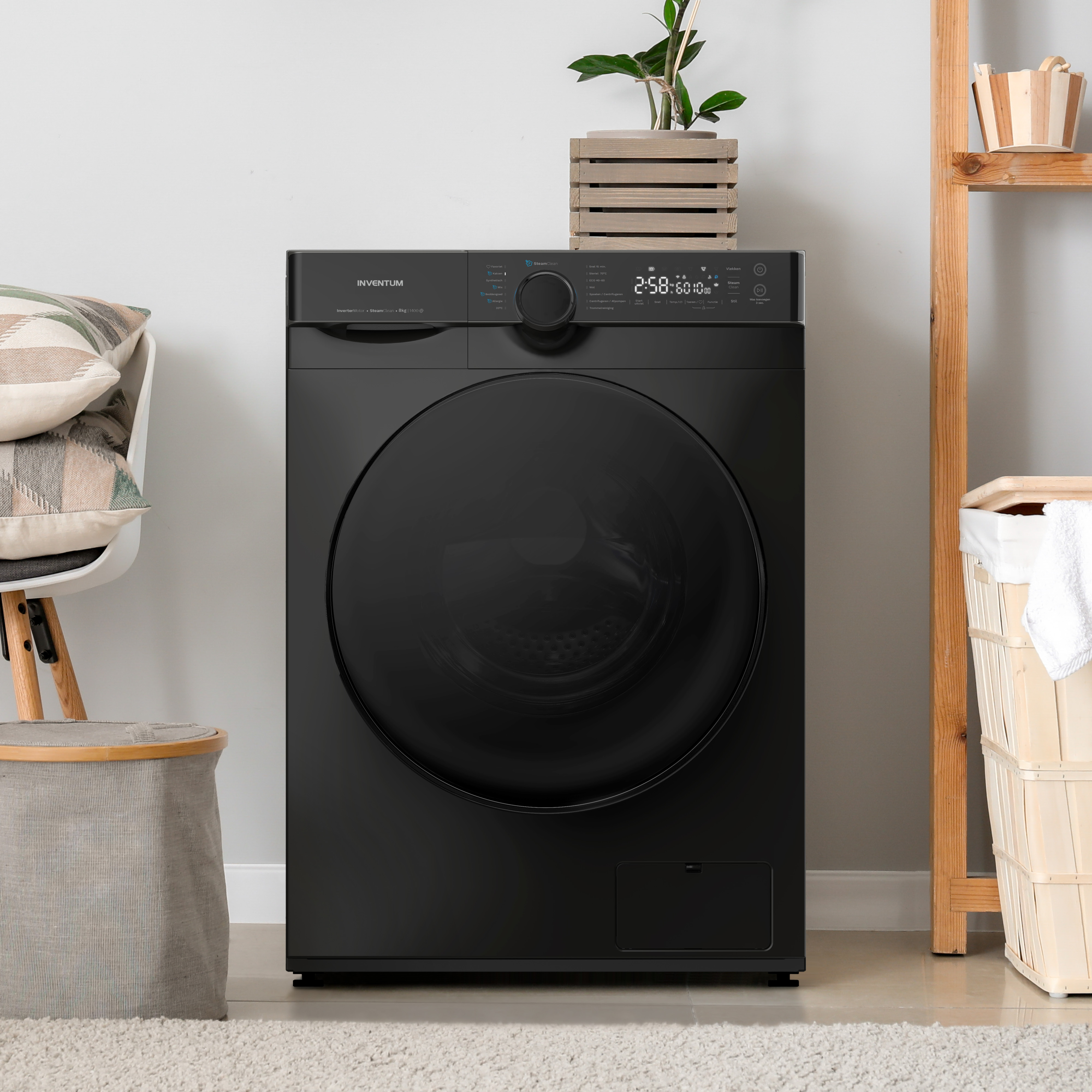 A black washing machine in a laundry room setting.