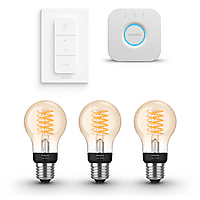 MediaMarkt PHILIPS HUE Starterspakket E27 met 3 Filament Standaard Lampen (A60) Goud - Incl. 1 Hue Bridge, 1 Hue Dimmer Switch, Hue... aanbieding