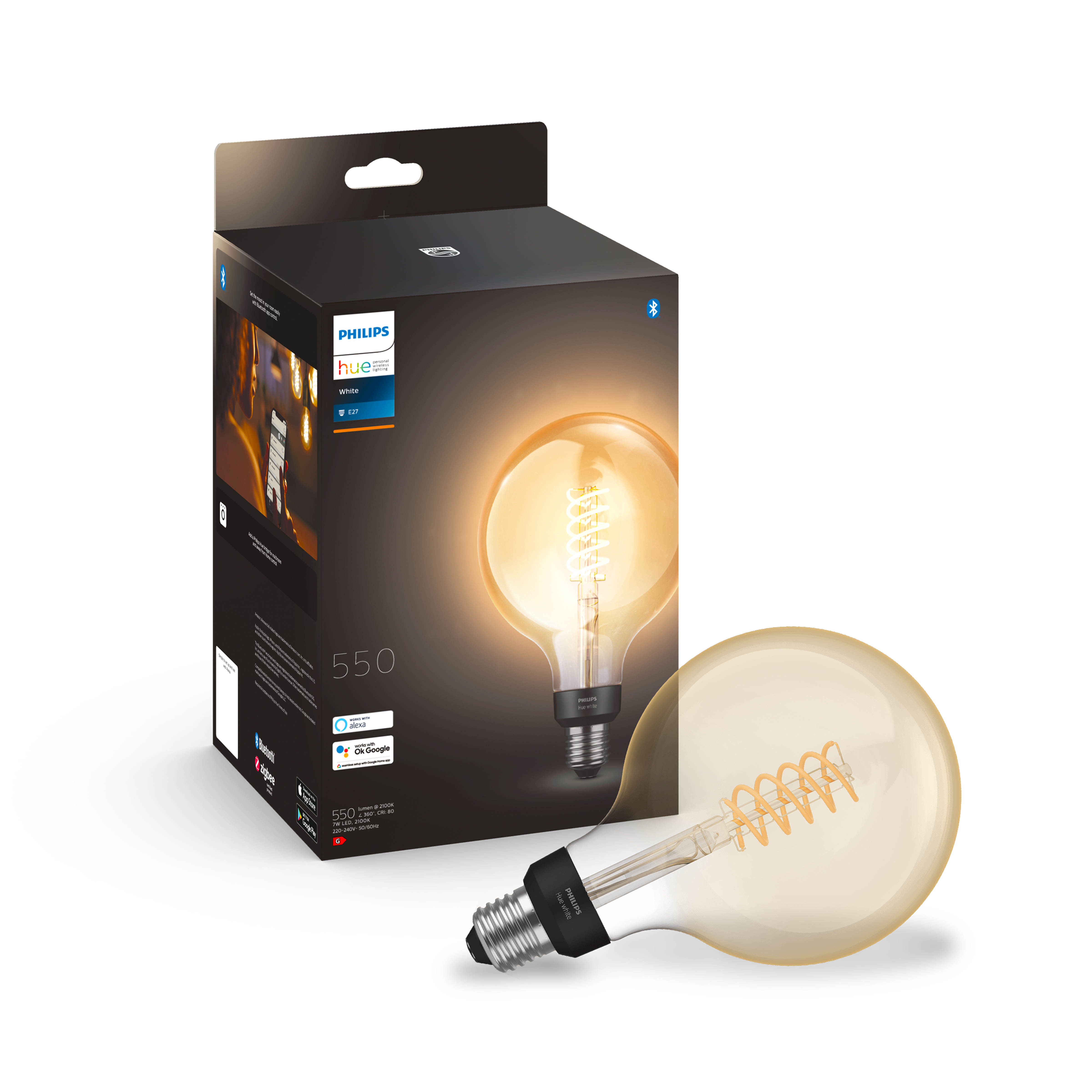 A large Philips Hue light bulb and a box. The bulb is round and has a spiral filament.