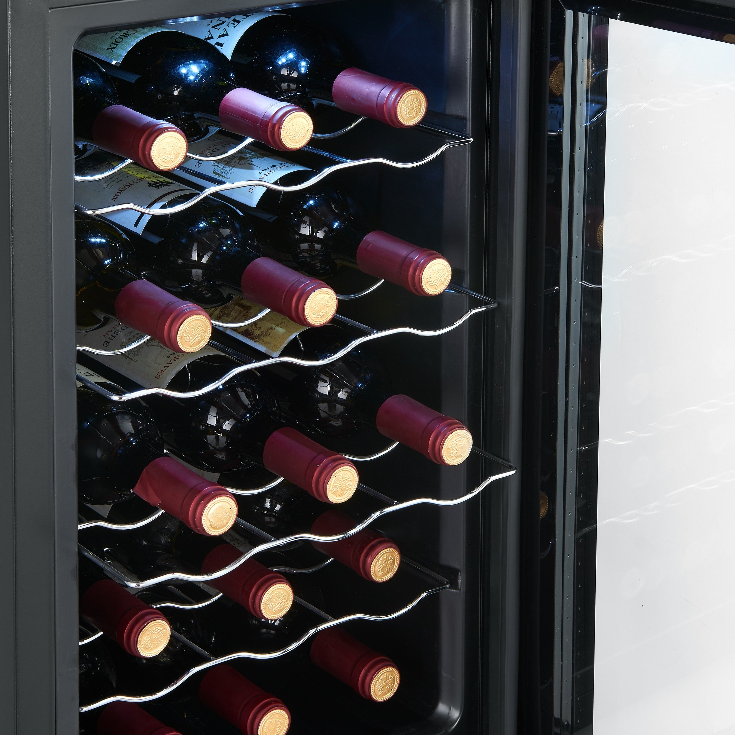Wine cooler with bottles of wine, red cap, silver racks, transparent door.