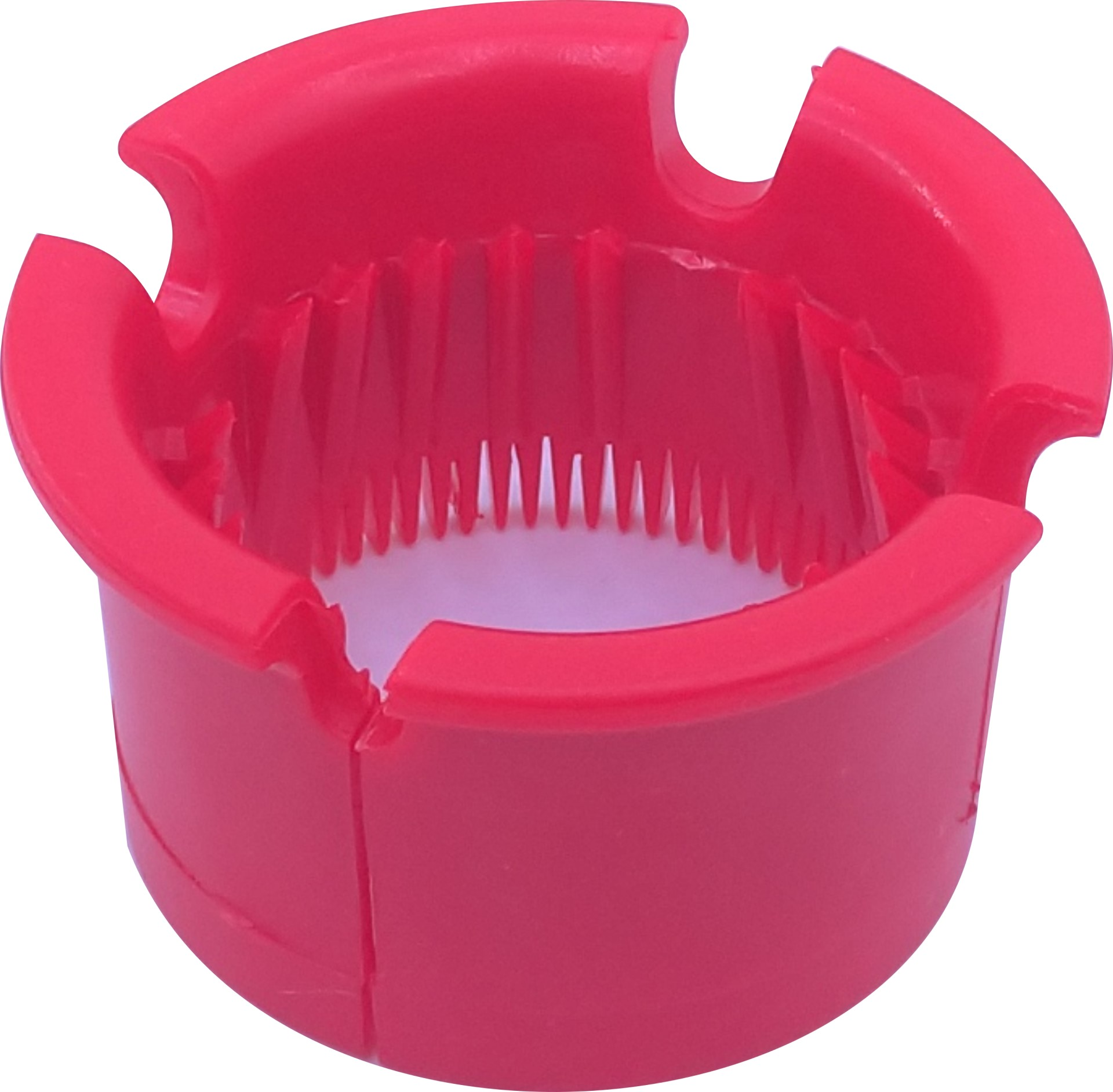 Roter Aschenbecher aus Kunststoff. Kreisförmig mit Rillen zum Halten von Gegenständen.