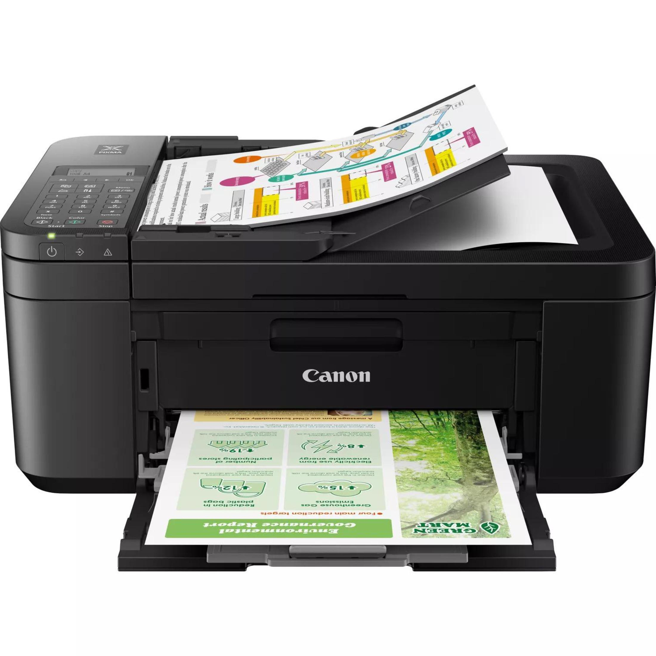 Una stampante Canon nera che stampa documenti con grafici e testo colorati.