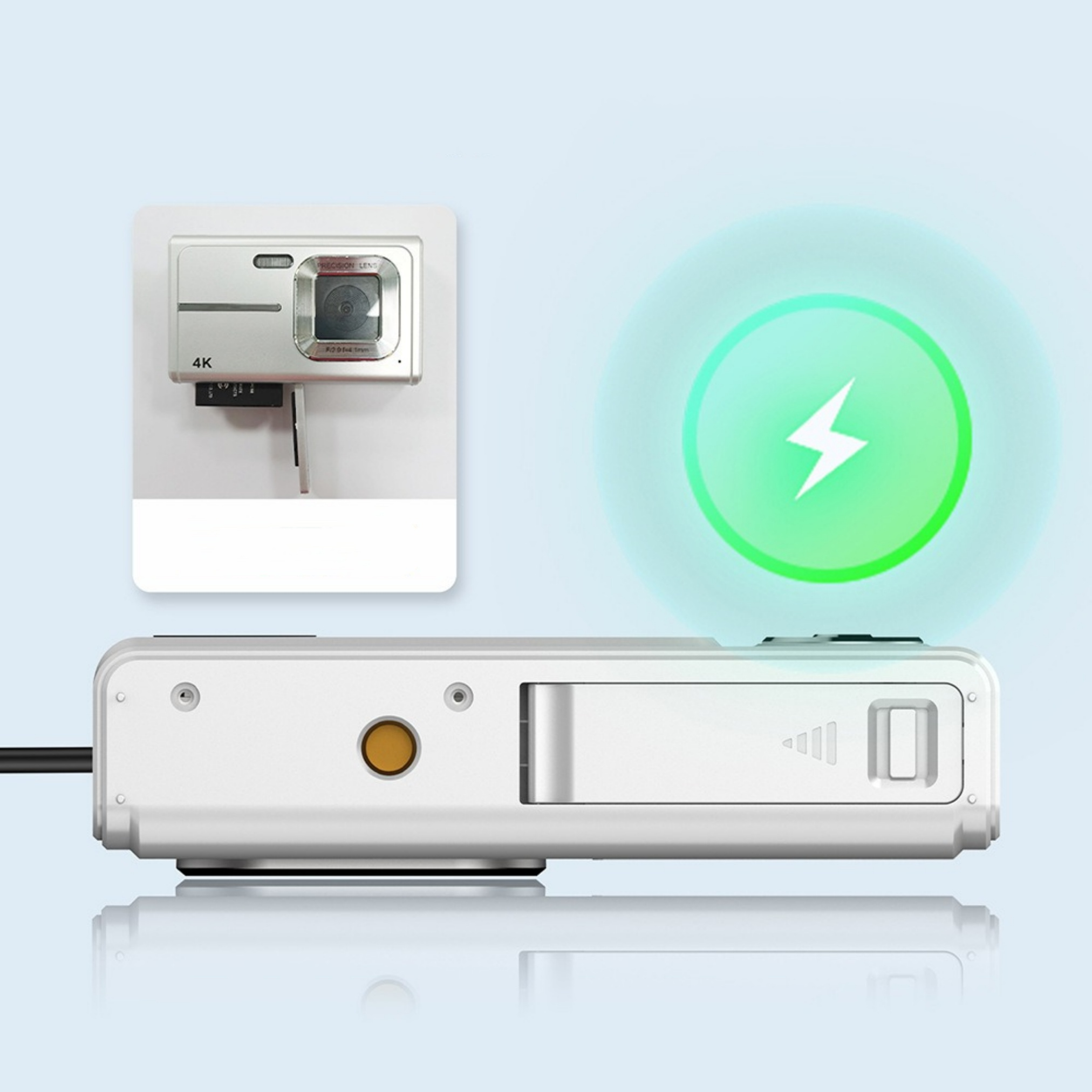 Ein weißes Gerät mit Kamera, verbunden mit einer Ladestation, mit einem grünen Blitzsymbol.