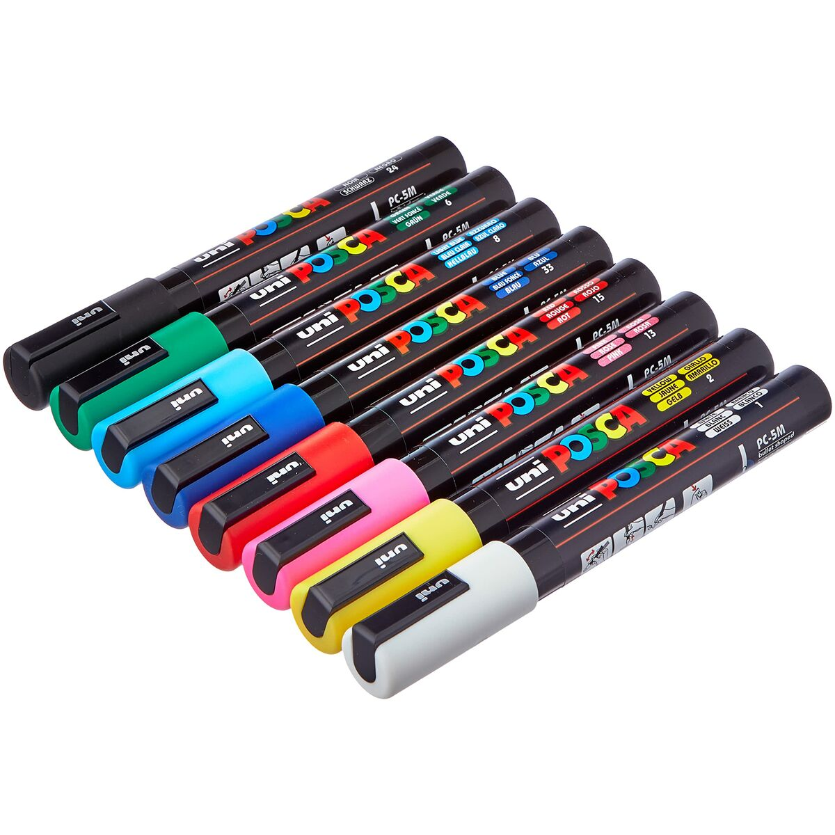 Un conjunto de ocho marcadores Uni Posca negros en varios colores, en ángulo sobre una superficie blanca.