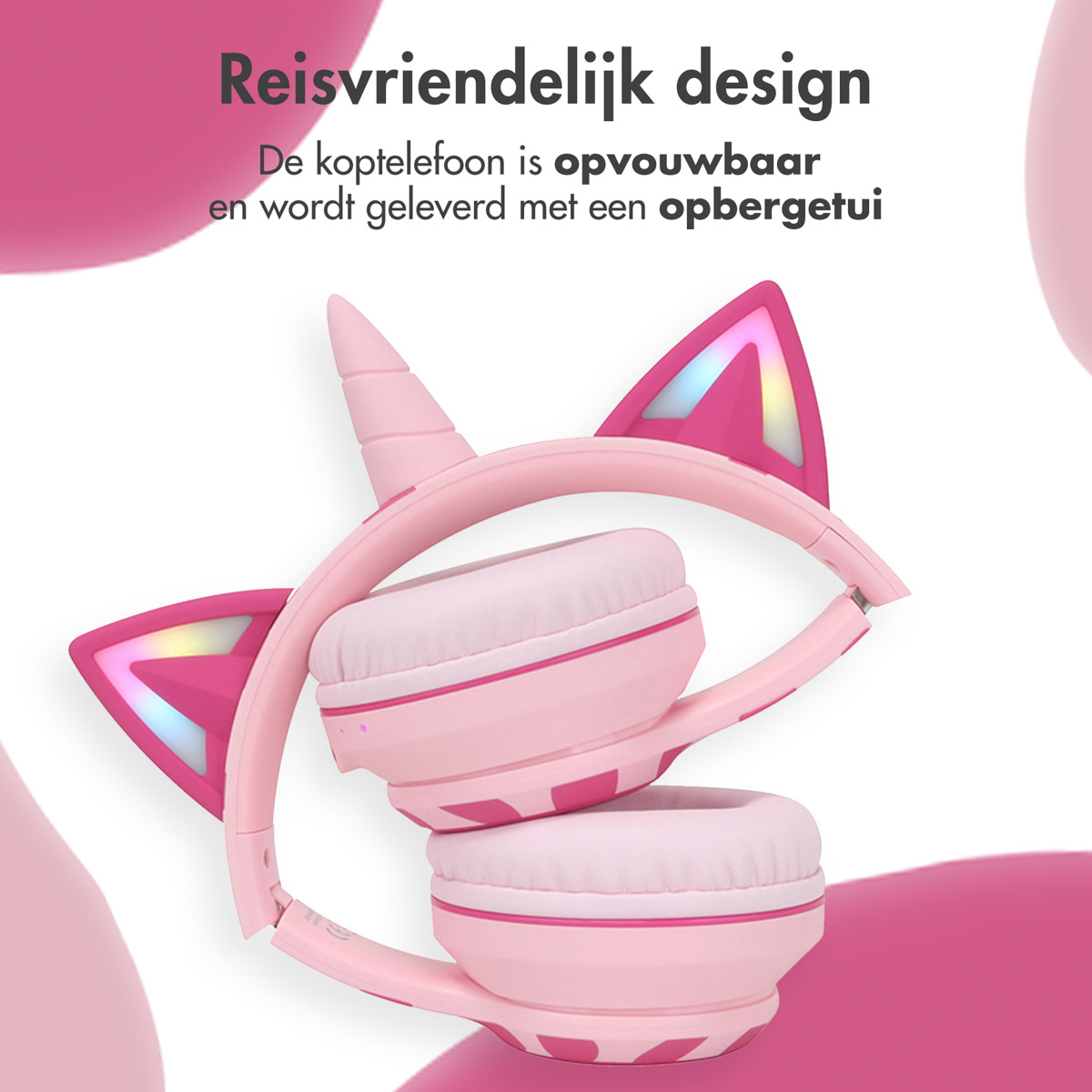Cuffie unicorno rosa, piegate, con sfondo rosa e bianco.
