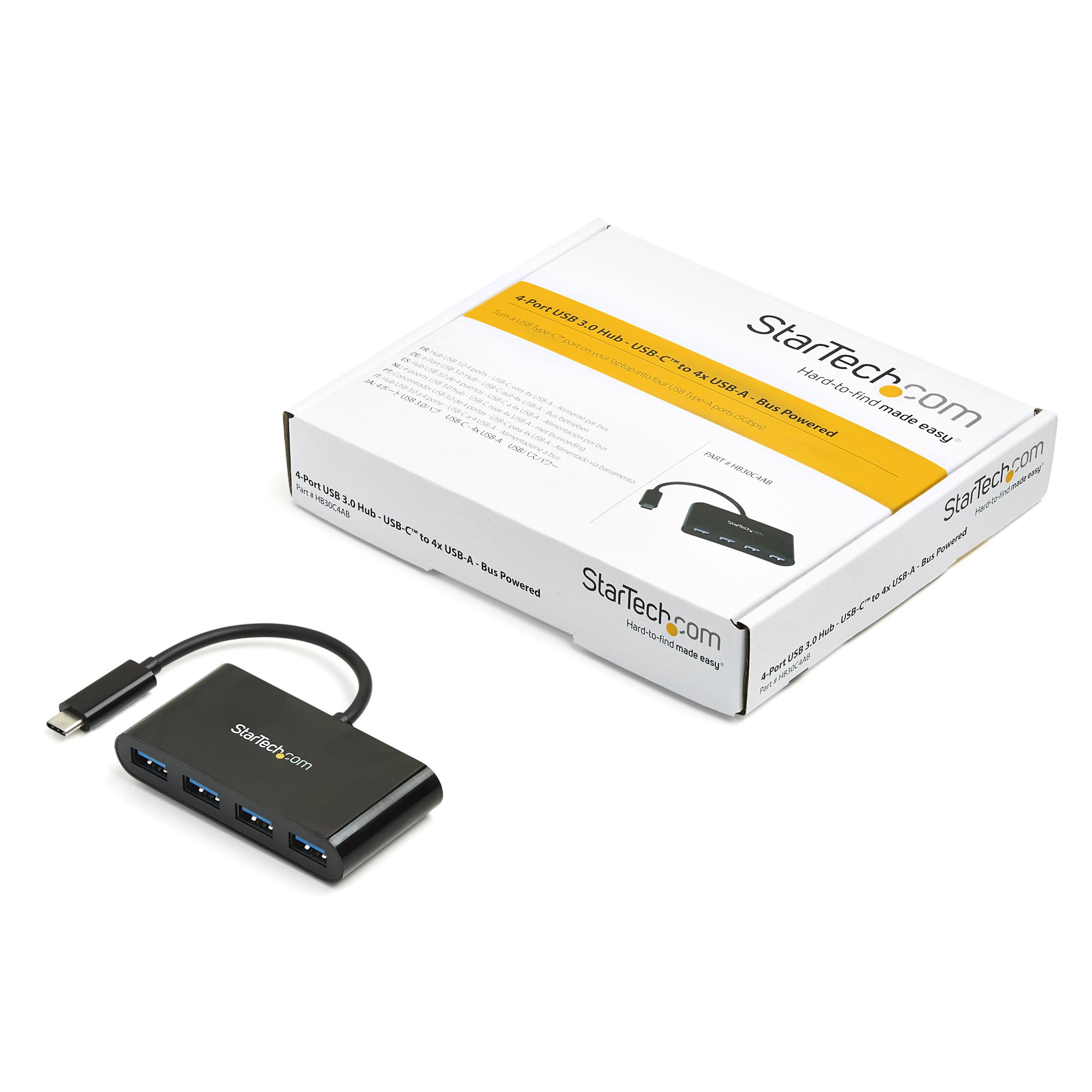 Hub USB nero con cavo collegato e scatola. Contiene 4 porte USB 3.0.