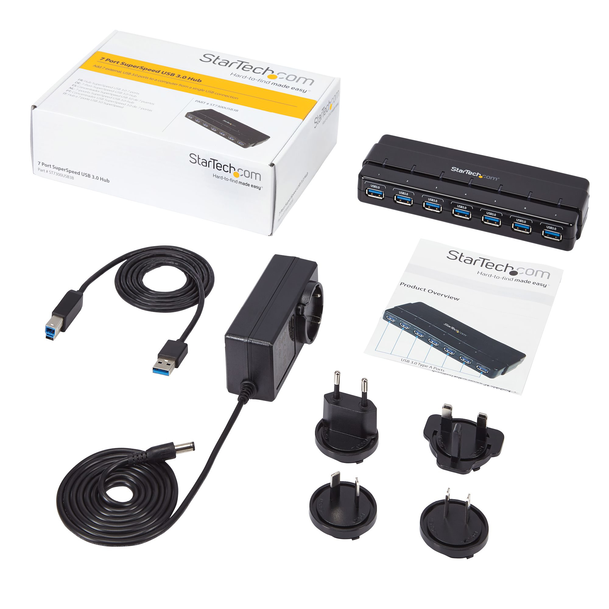 Kit hub USB con hub, adattatore di alimentazione e vari adattatori. Panoramica del prodotto visibile.