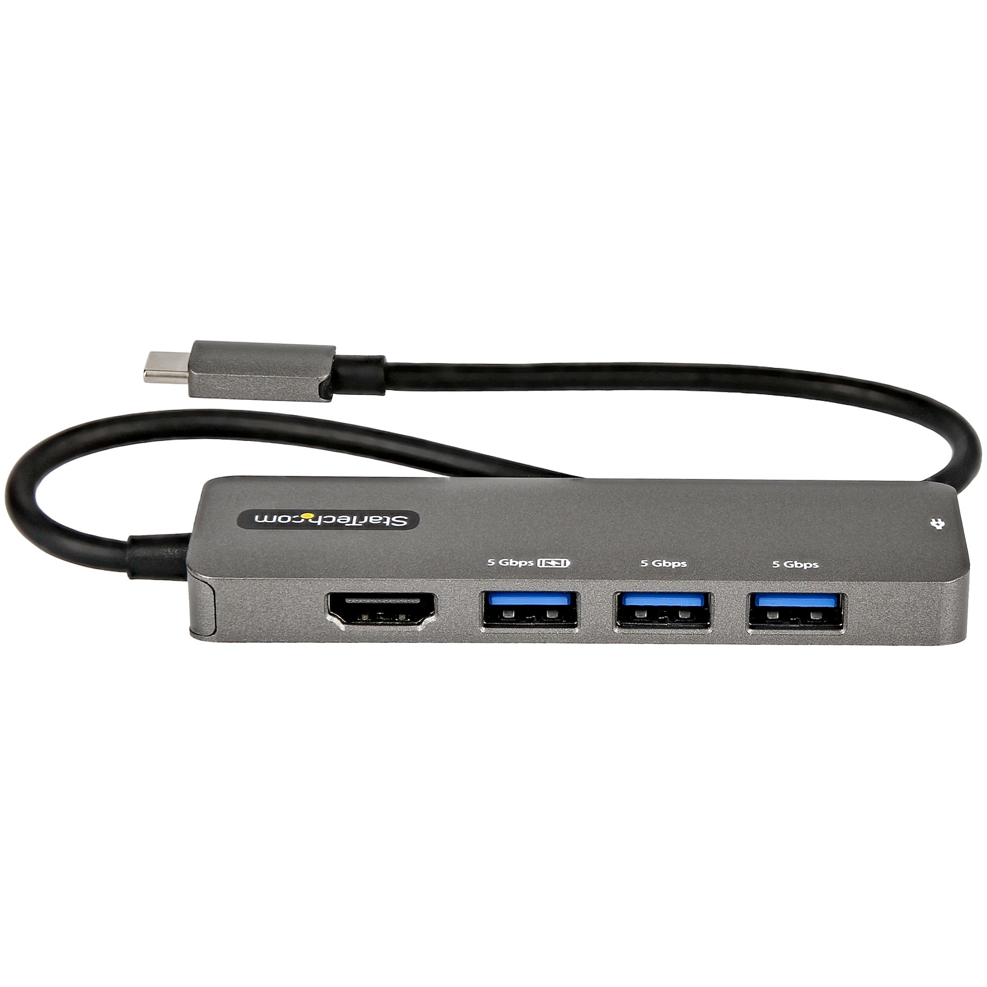 Concentrador USB Startech.com gris con múltiples puertos USB y un cable.