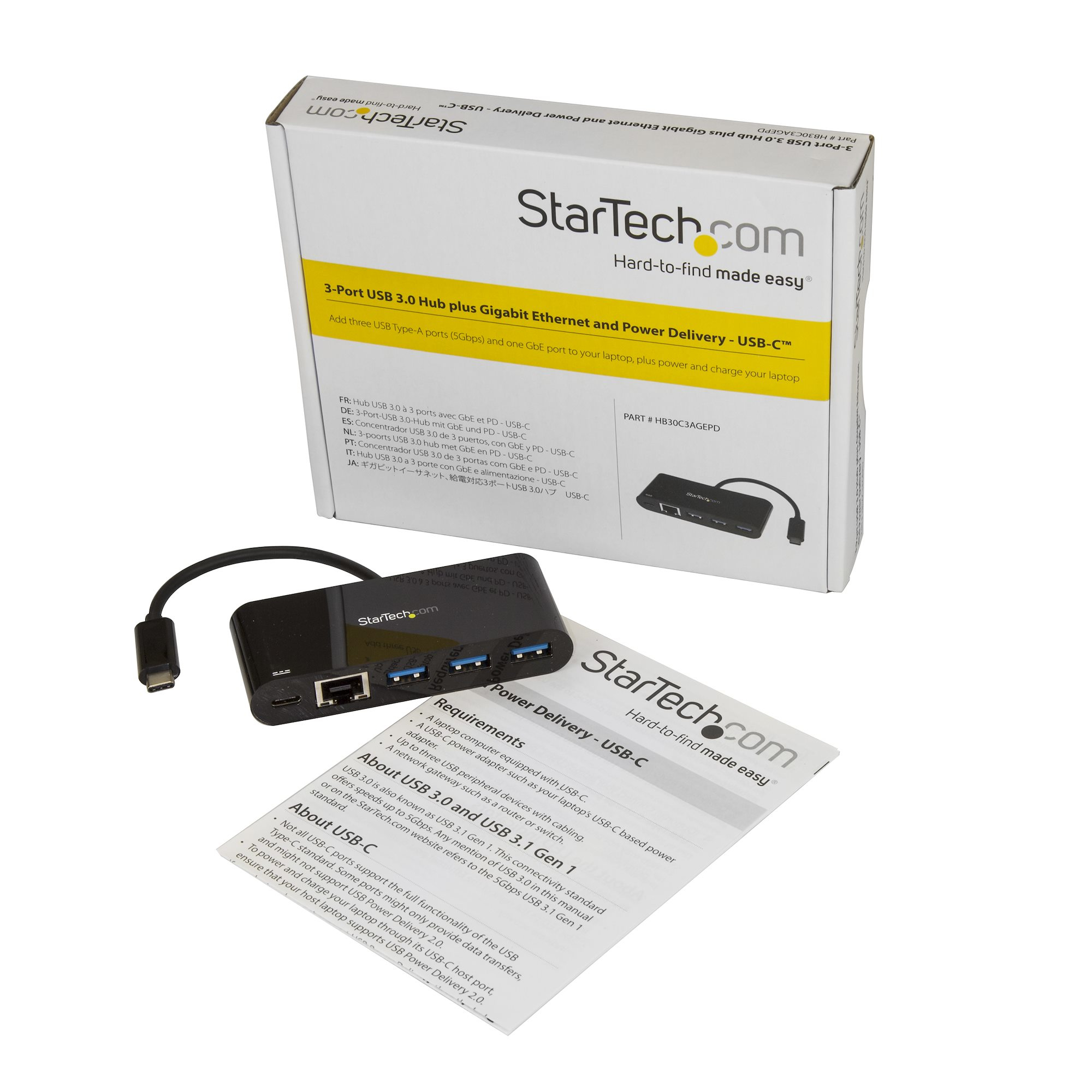Una caja de producto para un concentrador USB con accesorios sobre un fondo blanco.