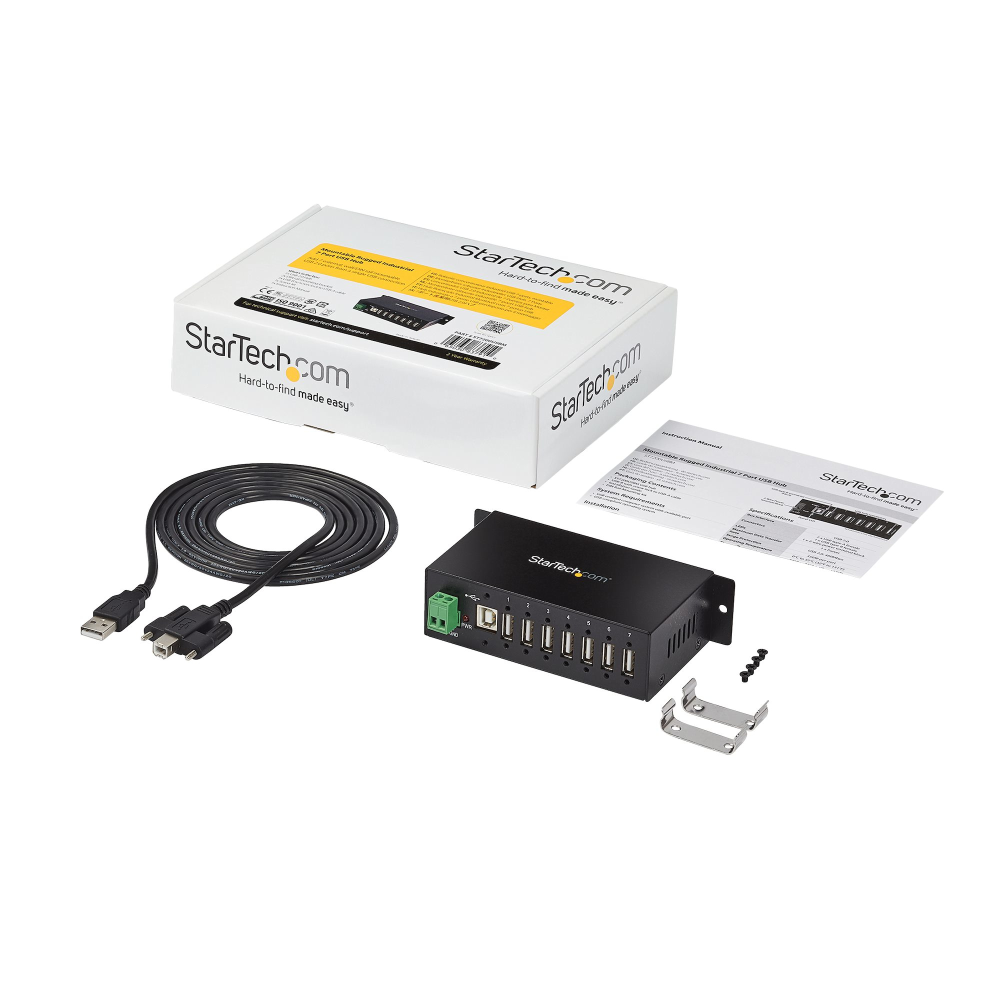 Scatola bianca con logo StarTech.com, hub USB, cavo e accessori su una superficie bianca.