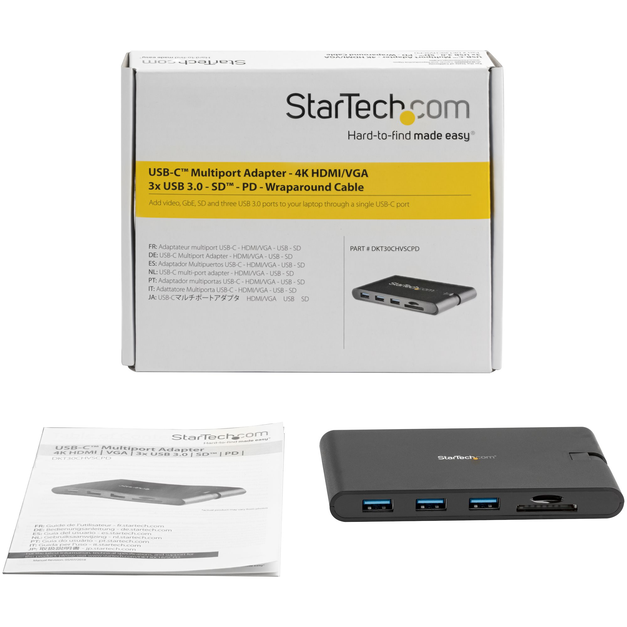 Scatola con adattatore USB-C multiporta e accessori. Sfondo bianco.