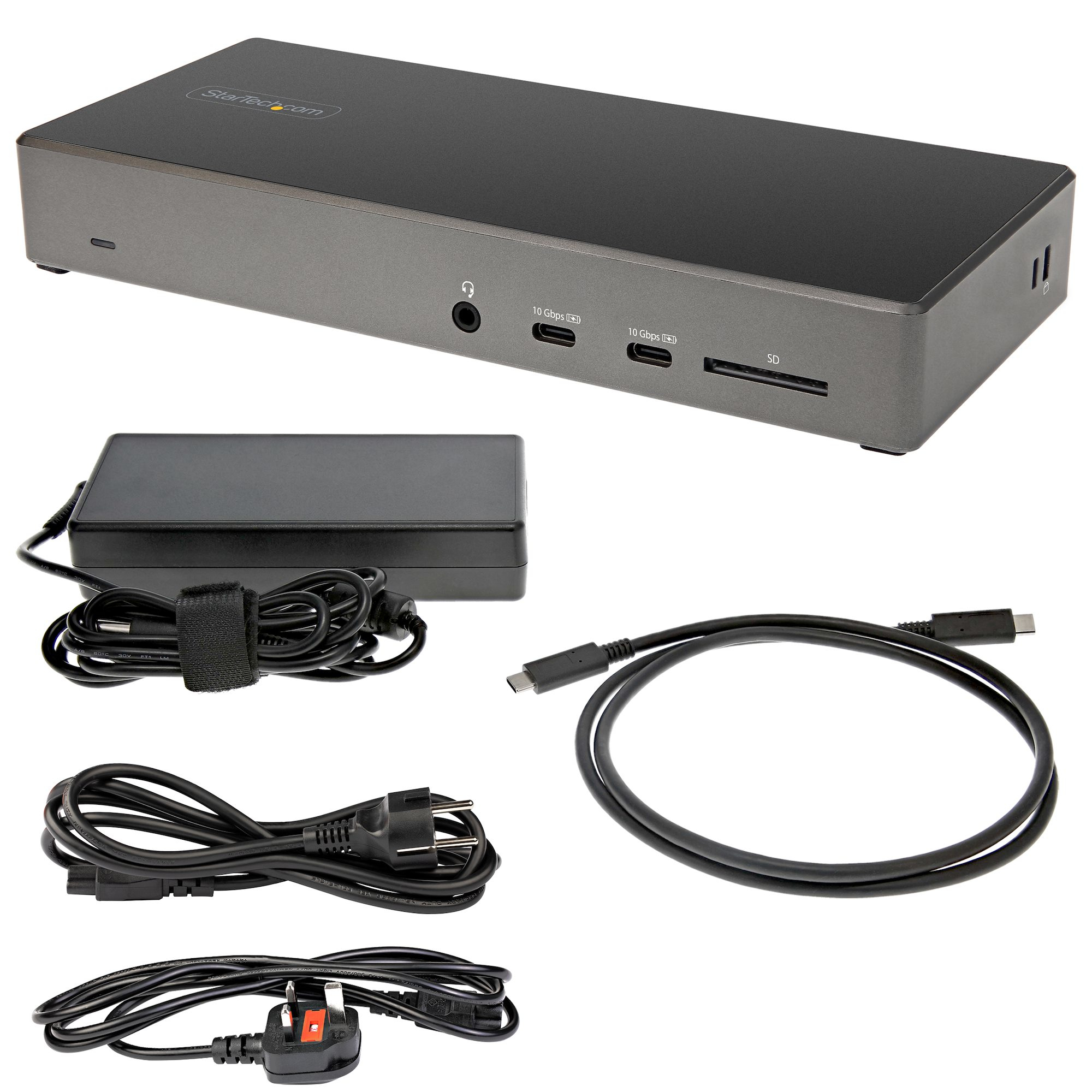 Dispositivo gris con múltiples puertos, fuente de alimentación y cables.
