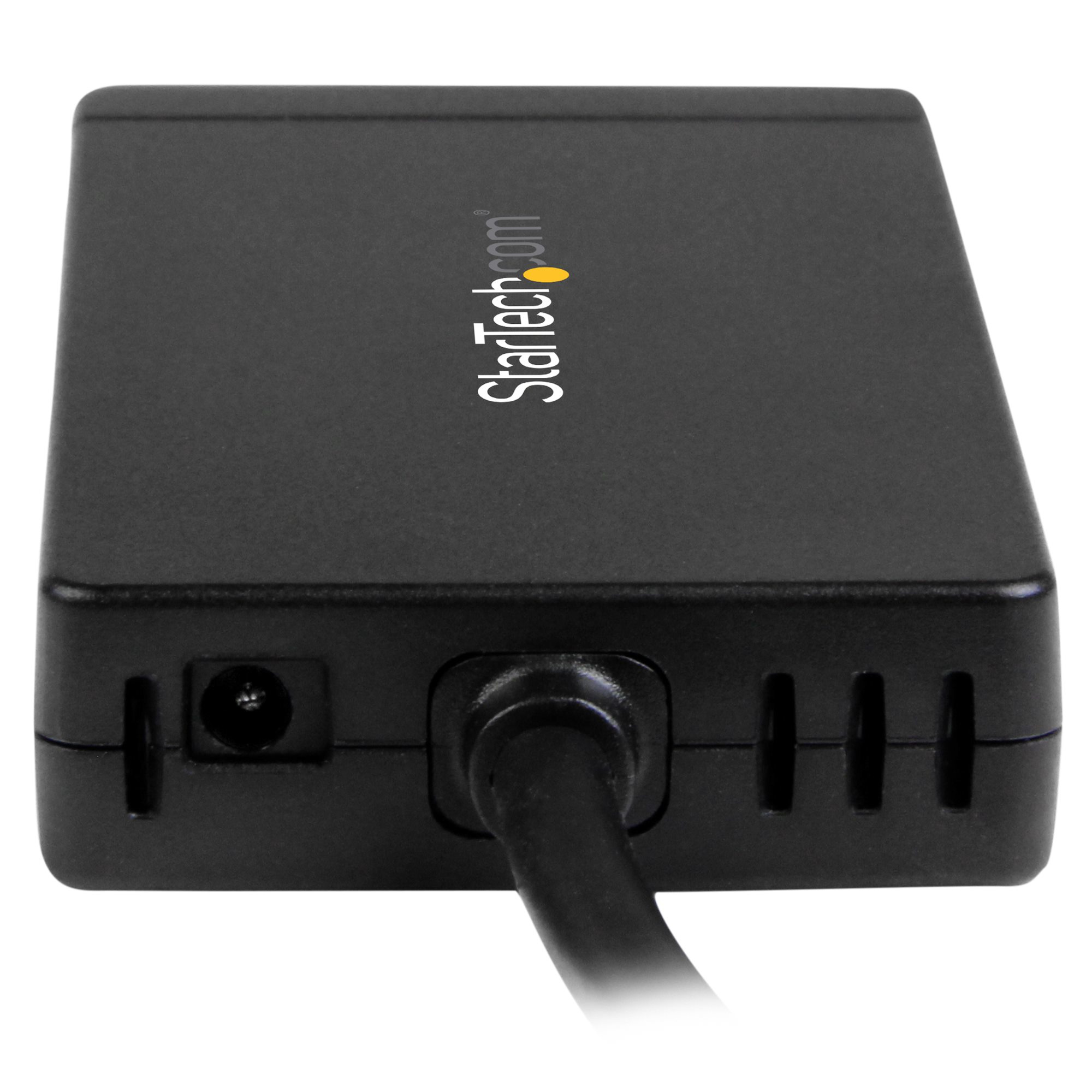 Primer plano de un adaptador de corriente negro con cable hacia abajo.
