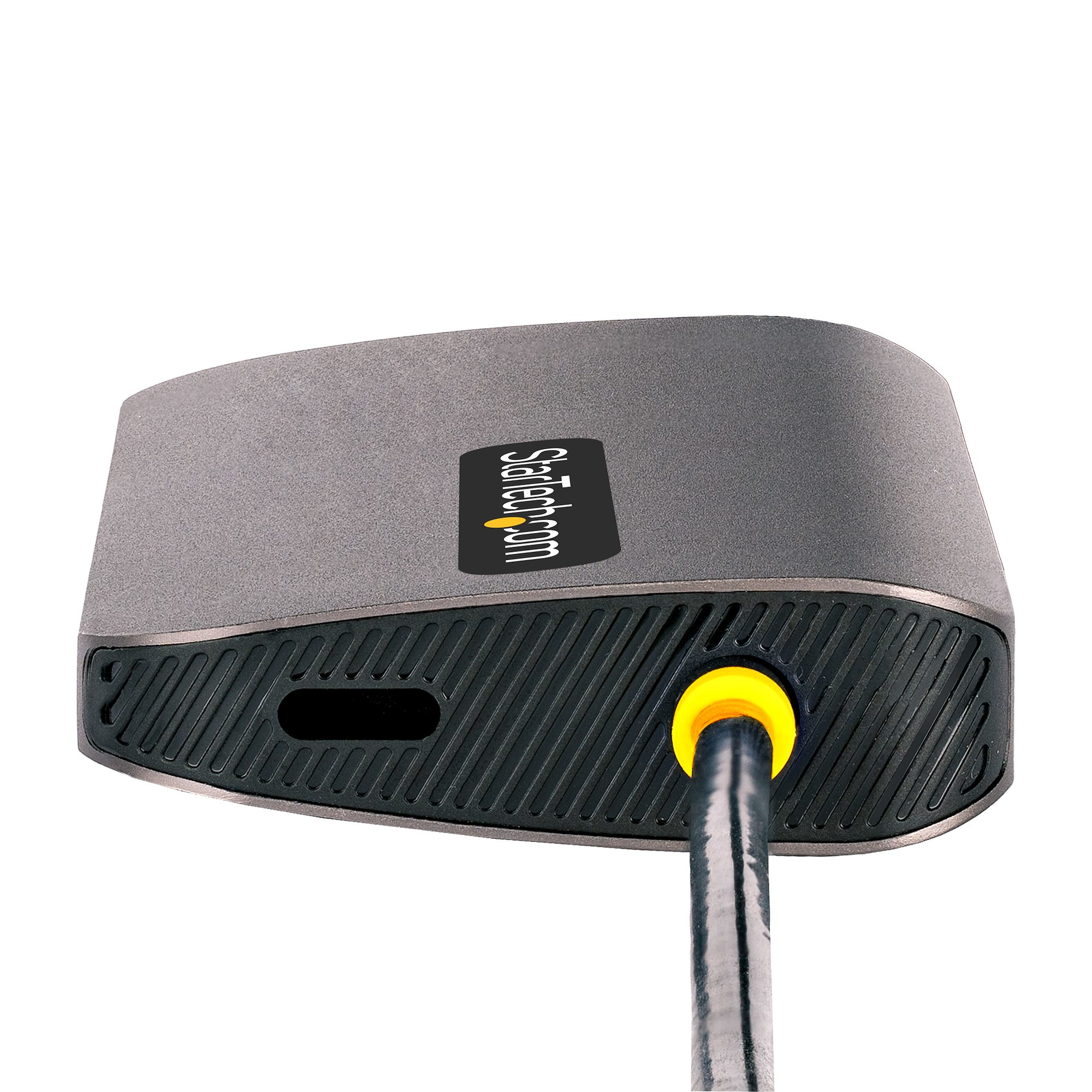 Disco duro externo gris y negro con un puerto amarillo. El nombre de la marca está en la parte superior.