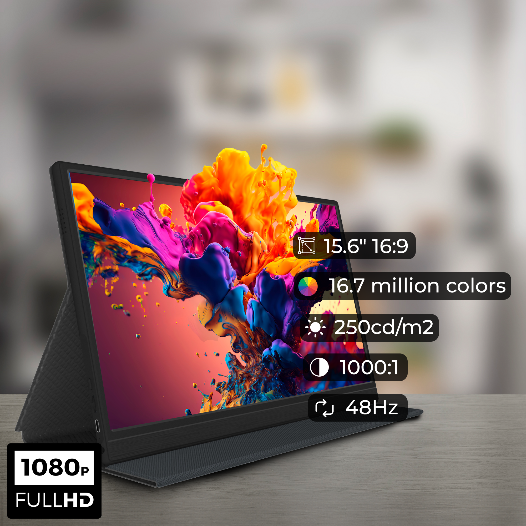 Zwarte tablet met kleurrijke abstracte afbeelding. Informatie: 15,6", 16:9, 16,7M kleuren, 250cd/m2, 1000:1, 48Hz.