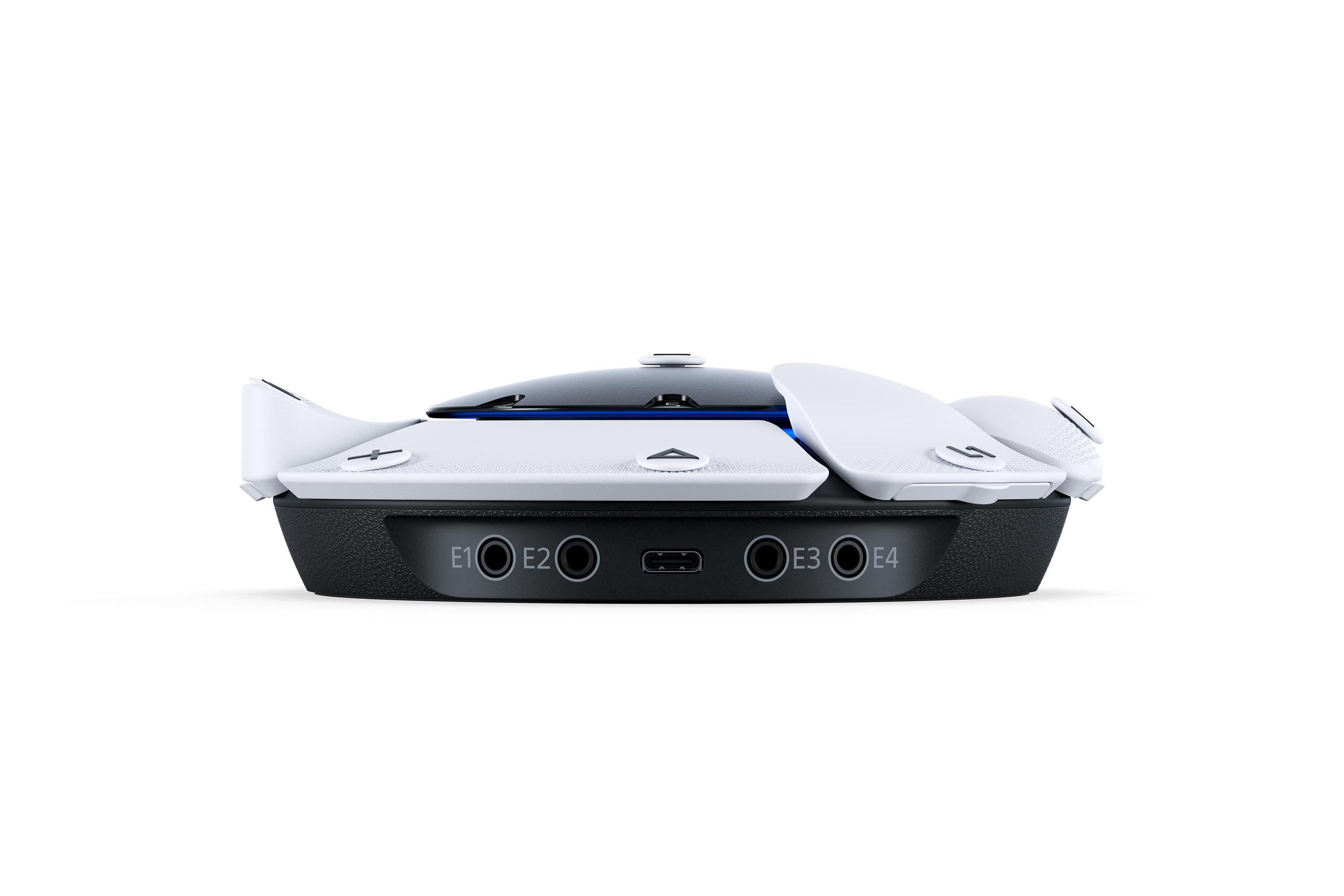 PlayStation VR2-Headset, schwarz und weiß, mit vier Anschlüssen, die unten mit E1-E4 beschriftet sind.