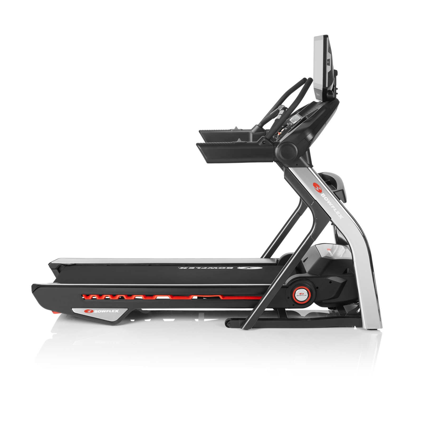Ein Bowflex Laufband. Es ist schwarz und silber mit einem großen Bildschirm und roten Akzenten.