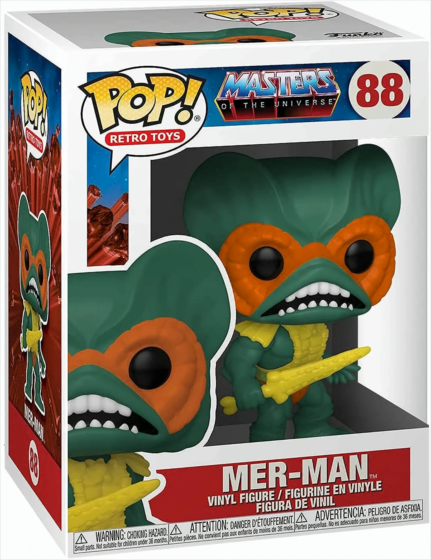 Eine Mer-Man Actionfigur in einer Box. Die Figur ist grün und orange, ein Spielzeug aus Masters of the Universe.