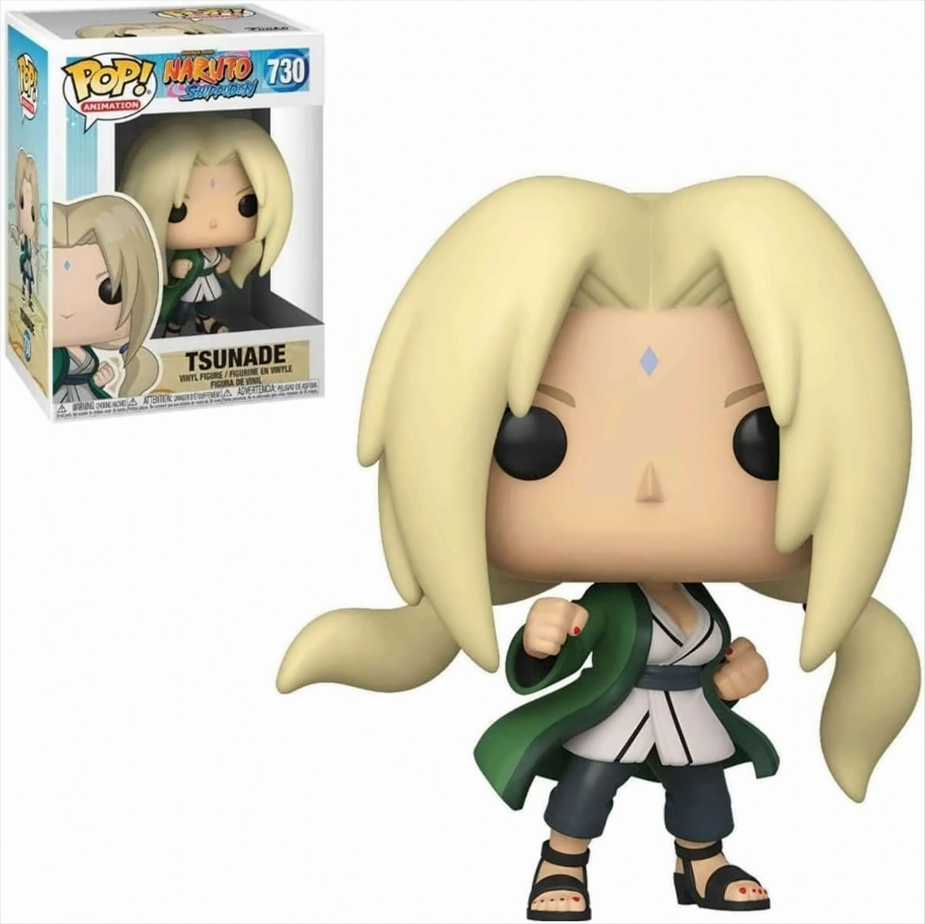 Una figura di Tsunade da Naruto, con una scatola. Indossa un cappotto verde e ha i capelli biondi.