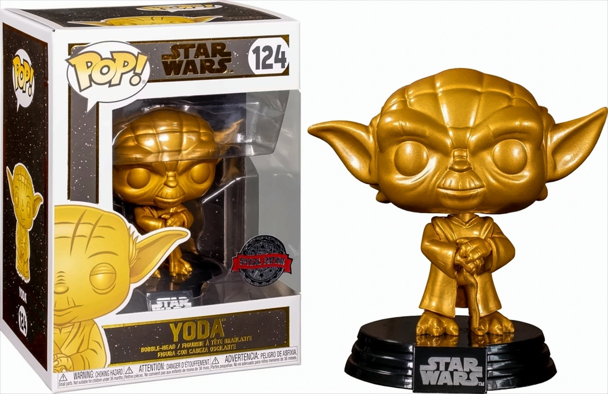 Eine goldene Yoda-Figur aus Star Wars. Sie steht auf einem schwarzen Ständer. Links ist eine Box.