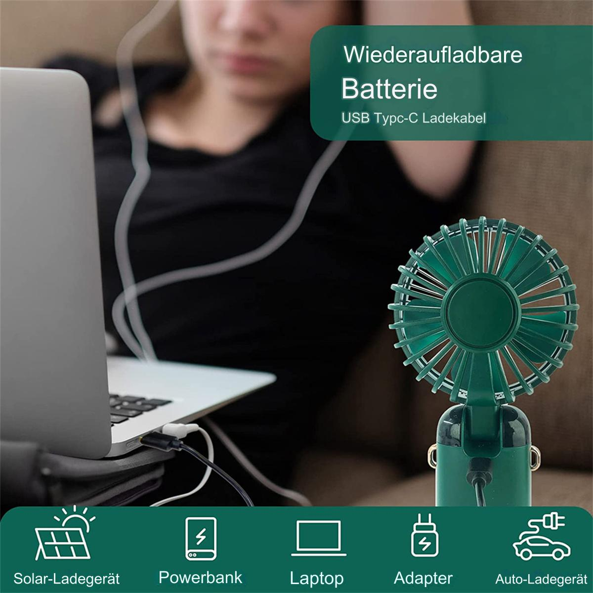 Grüner Mini-Ventilator mit Laptop und Ladekabeln.