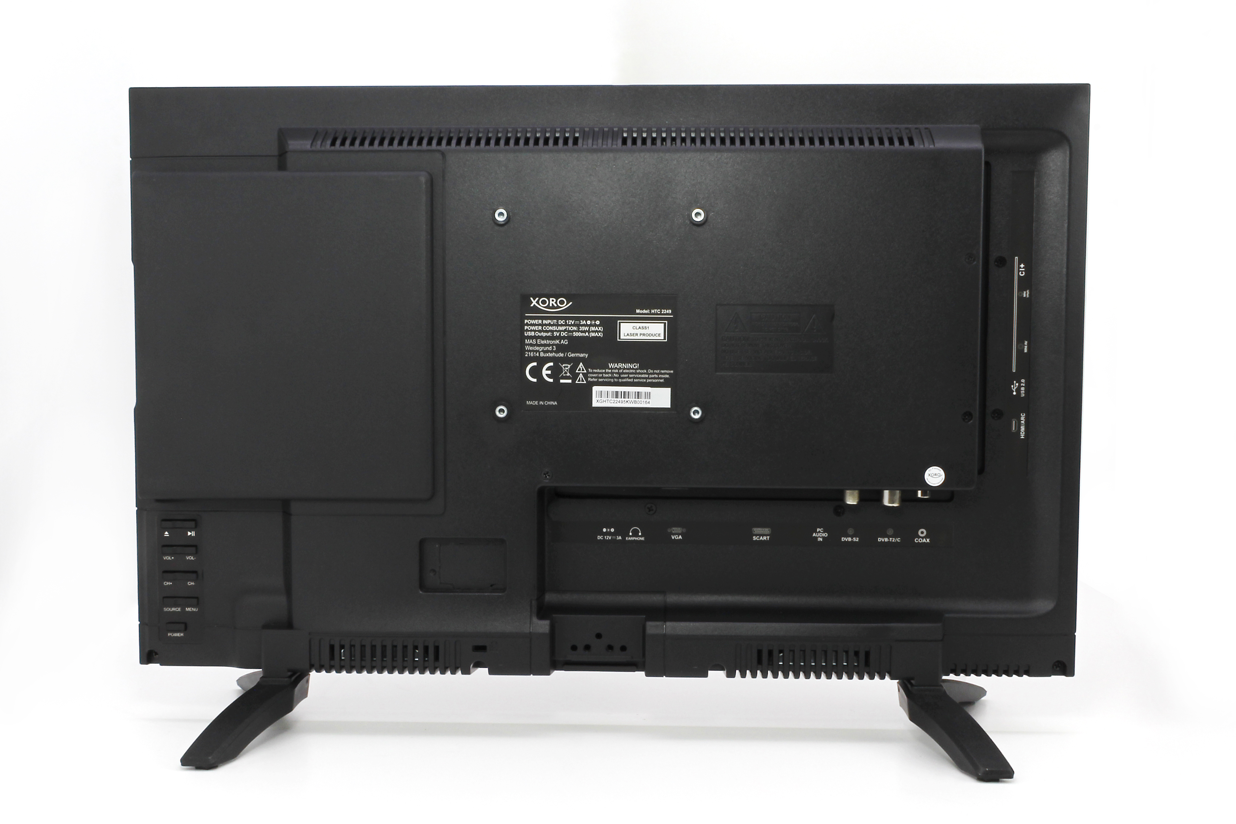 Tył czarnego telewizora. Pokazuje porty i nóżki na białym tle.