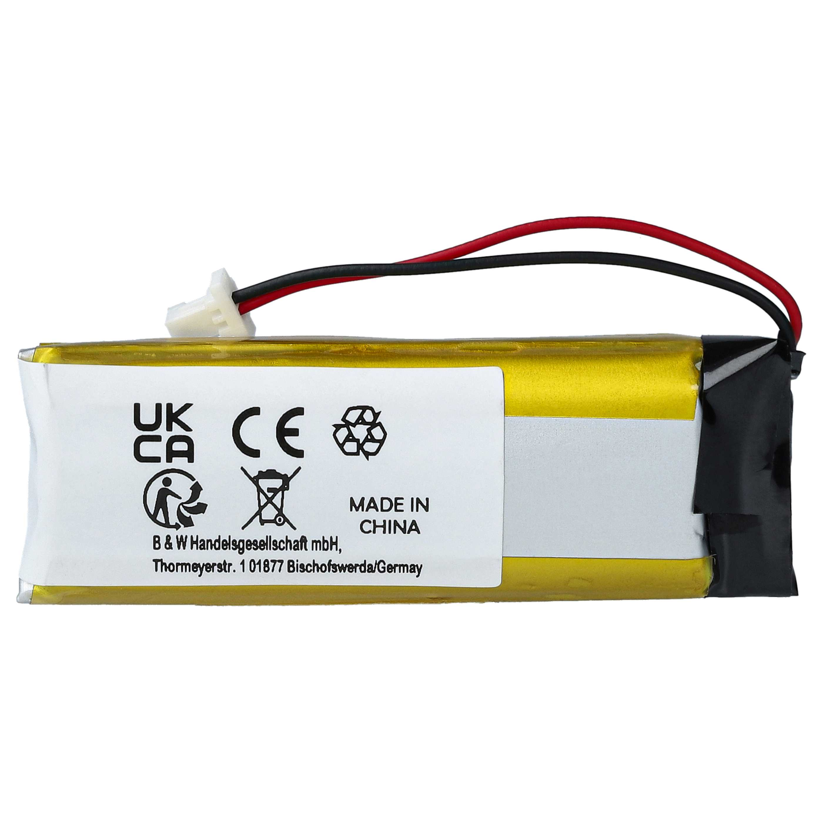 Eine gelbe Batterie mit schwarzen und roten Drähten und Textaufklebern.